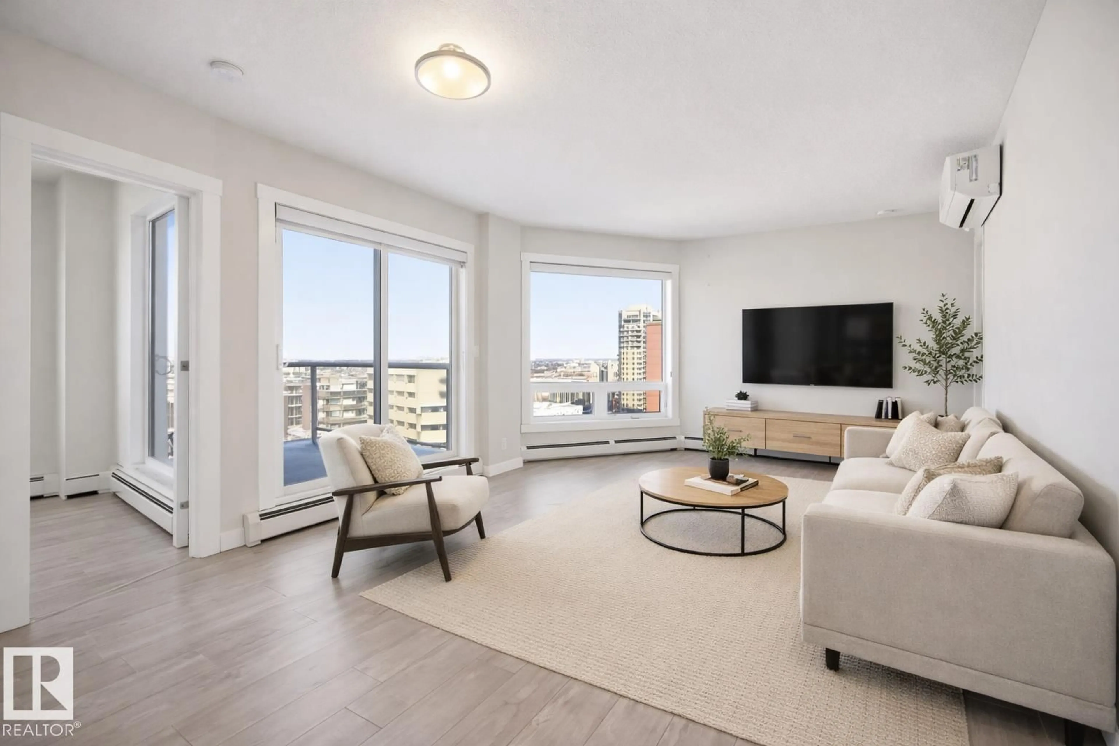 Living room with furniture, unknown for 10410 - 1206 102 AV, Edmonton Alberta T5J0E9