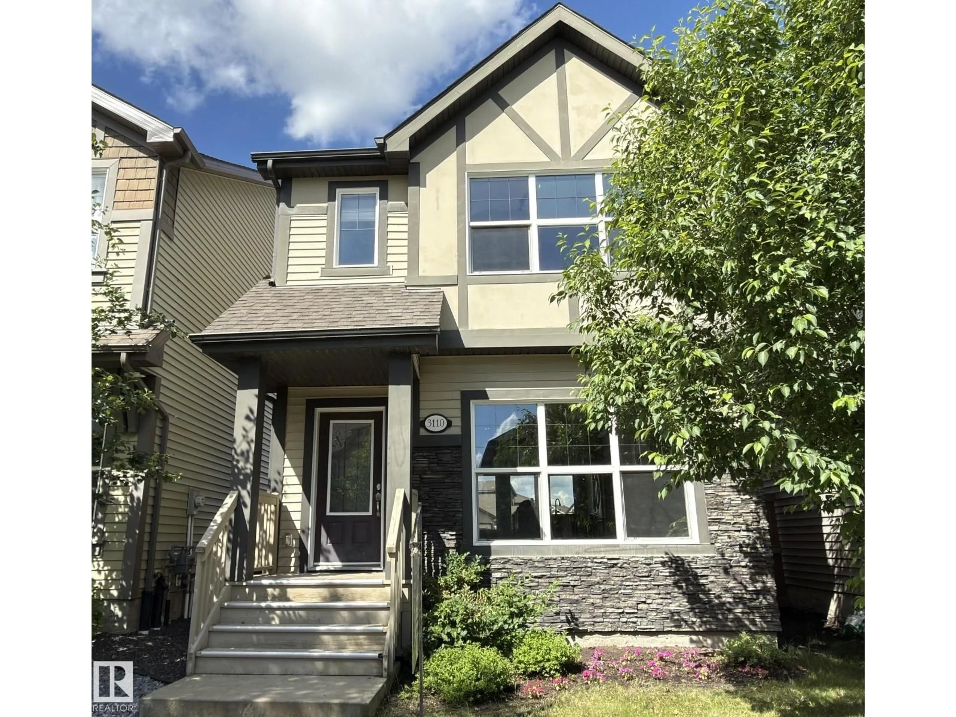 Home with vinyl exterior material, street for 3110 PAISLEY RD, Edmonton Alberta T6W1A3