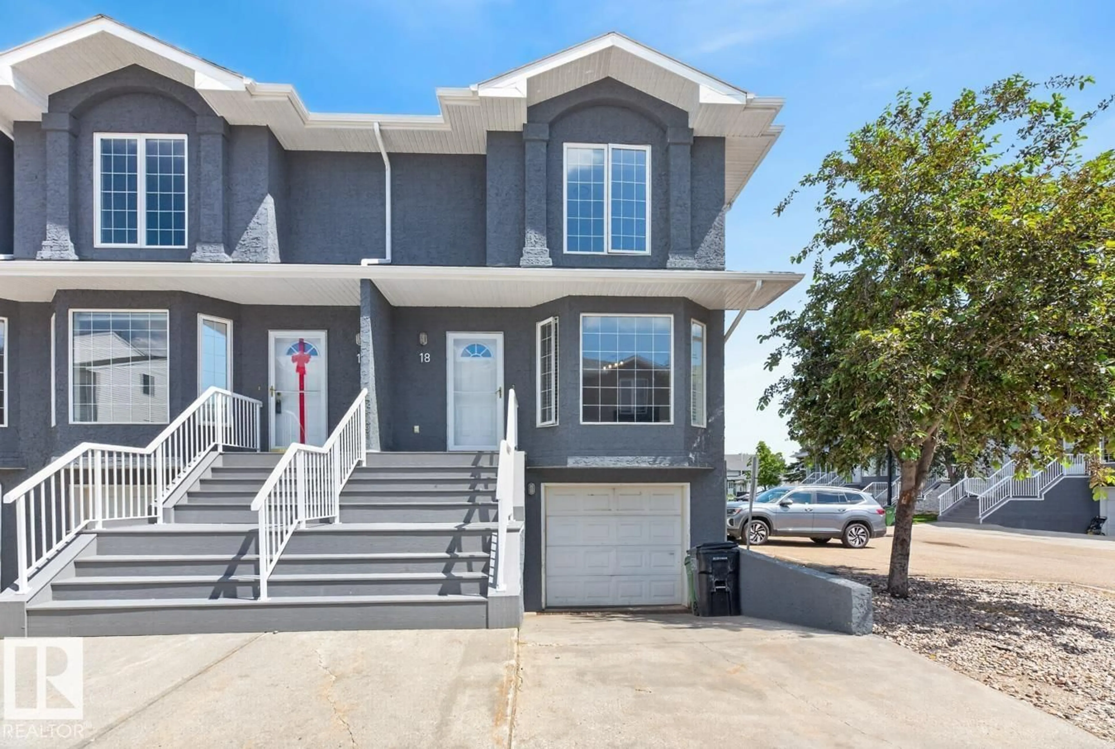 Home with vinyl exterior material, water/lake/river/ocean view for 18 15128 22 ST NW, Edmonton Alberta T5Y2W5