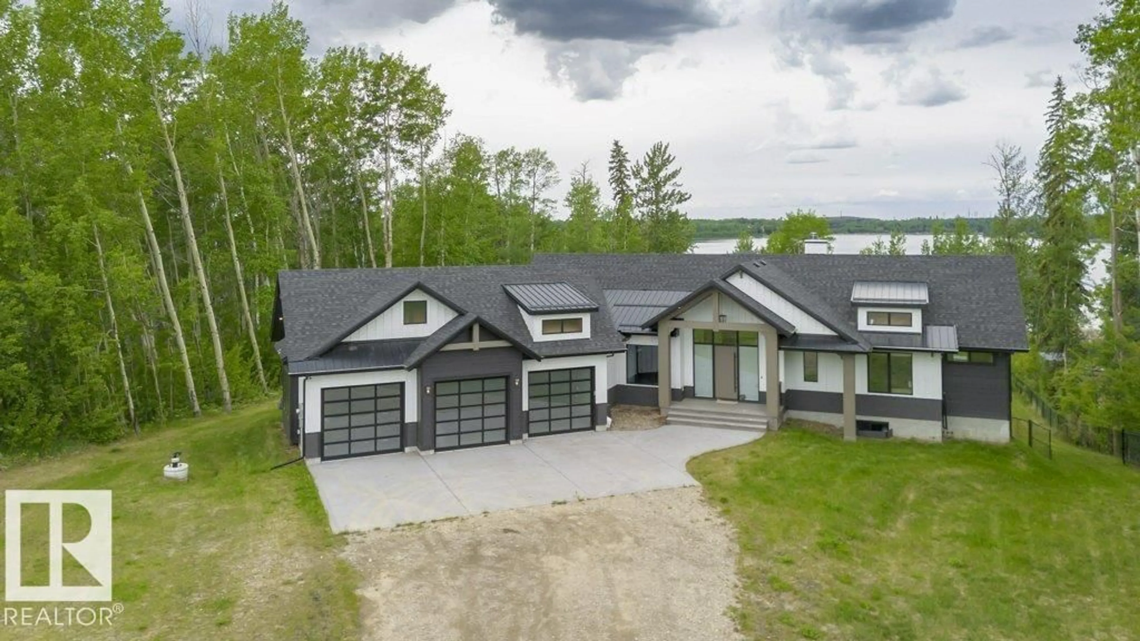 A pic from outside/outdoor area/front of a property/back of a property/a pic from drone, unknown for 42 - 2307 TWP ROAD 522, Rural Parkland County Alberta T7Y3L7