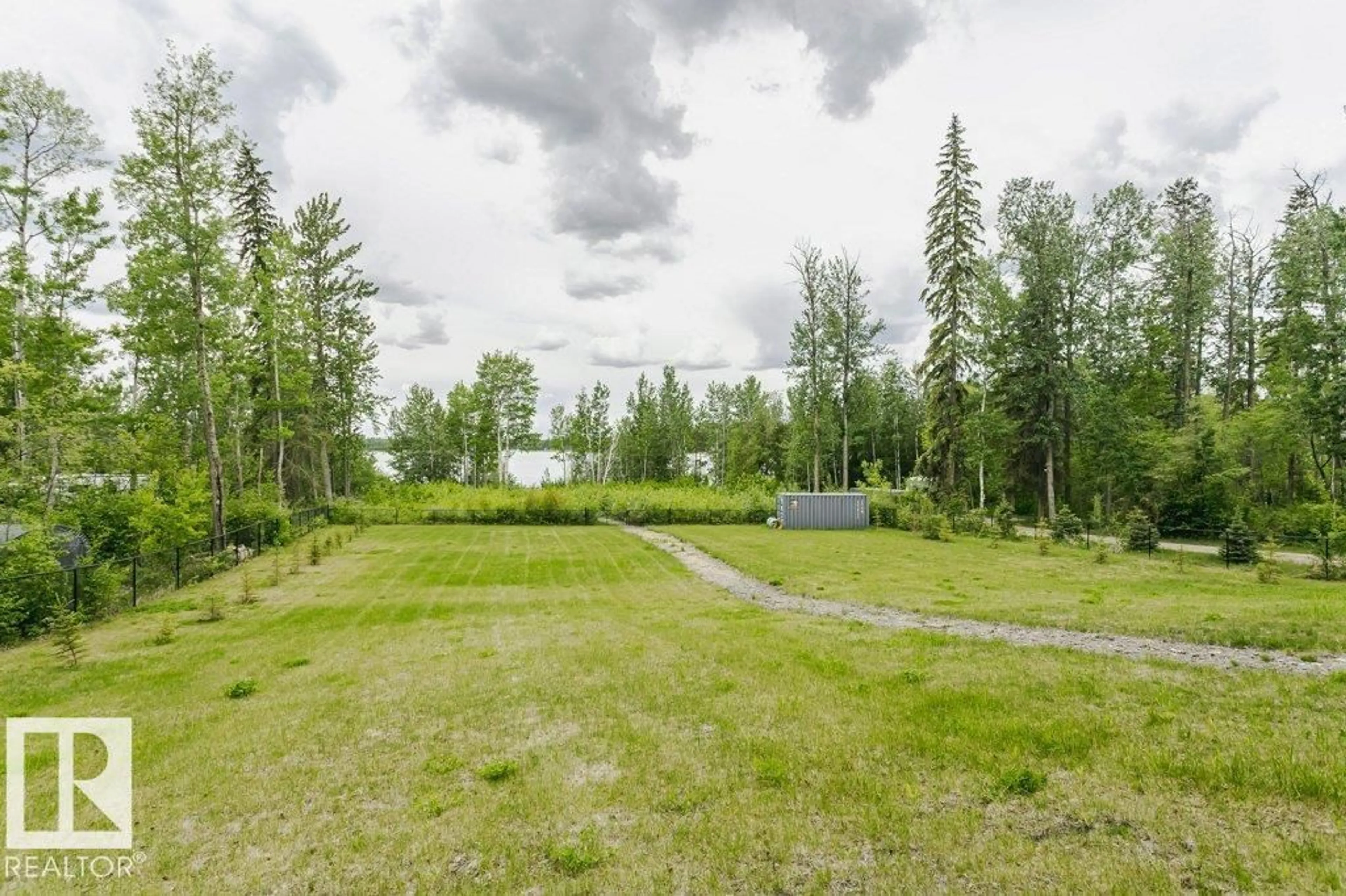 A pic from outside/outdoor area/front of a property/back of a property/a pic from drone, forest/trees view for 42 - 2307 TWP ROAD 522, Rural Parkland County Alberta T7Y3L7