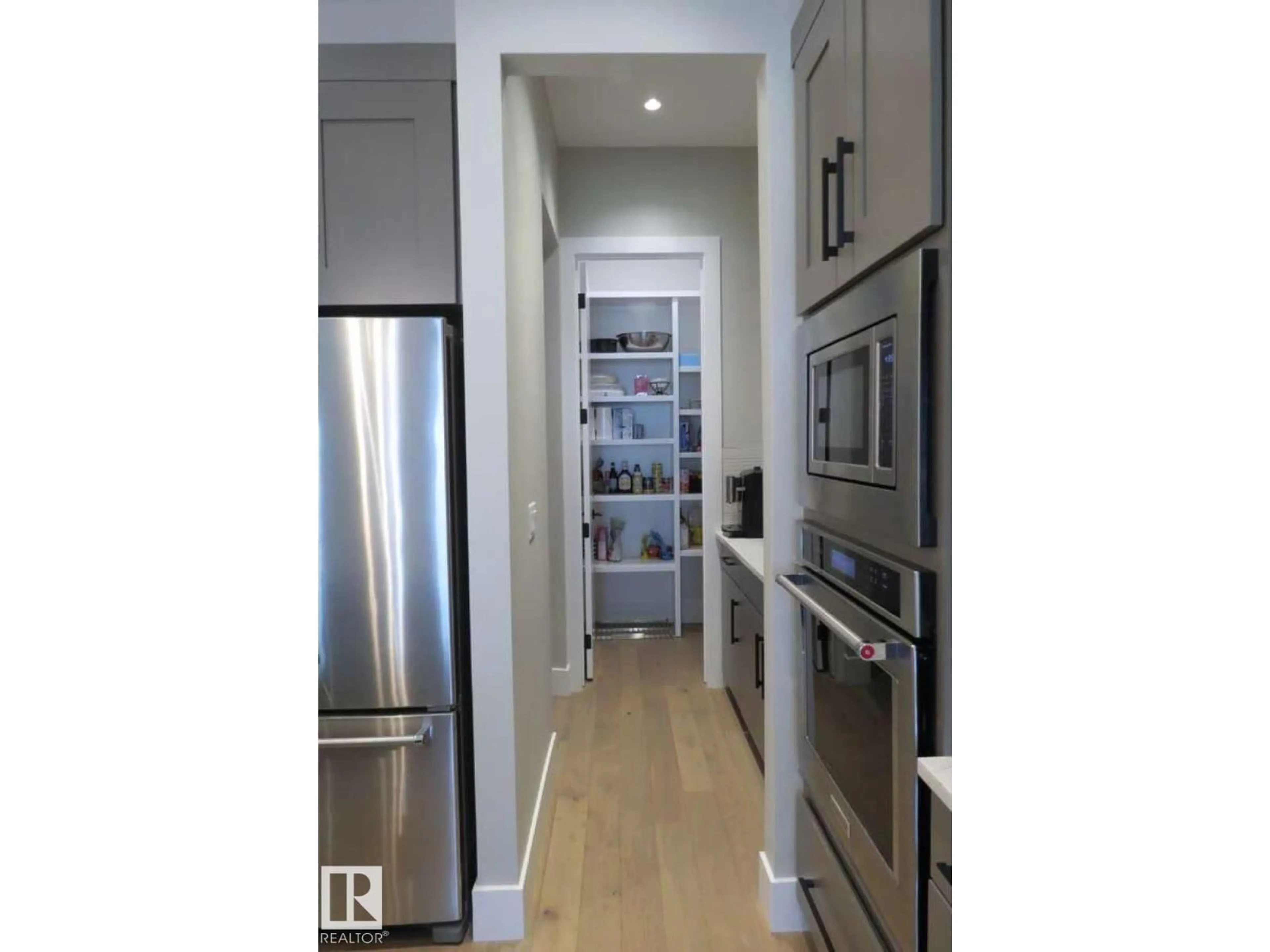 Contemporary kitchen, wood/laminate floor for 4605 KNIGHT PT, Edmonton Alberta T6W4B7