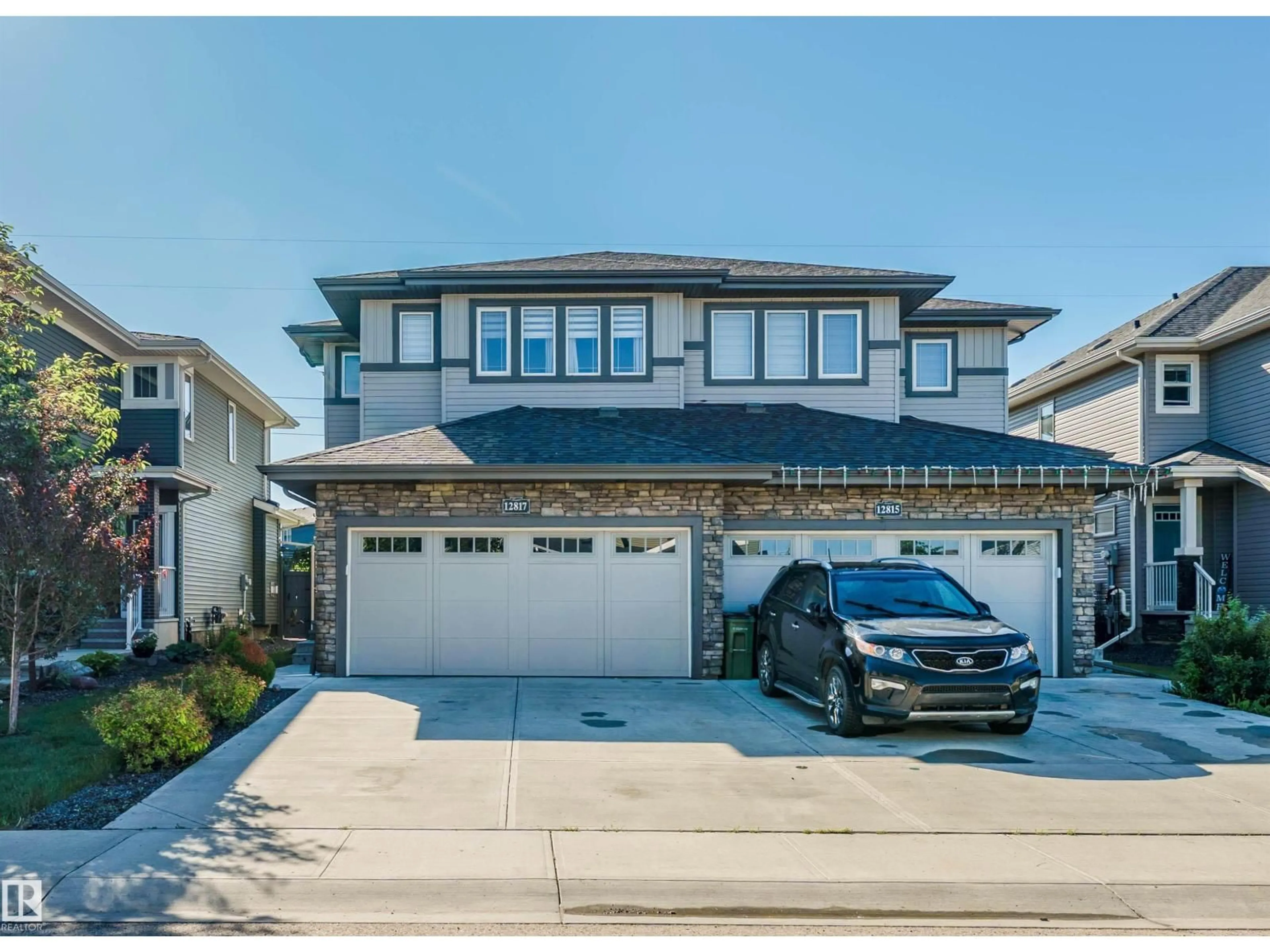 Home with vinyl exterior material, street for 12817 205 ST, Edmonton Alberta T5S0L8