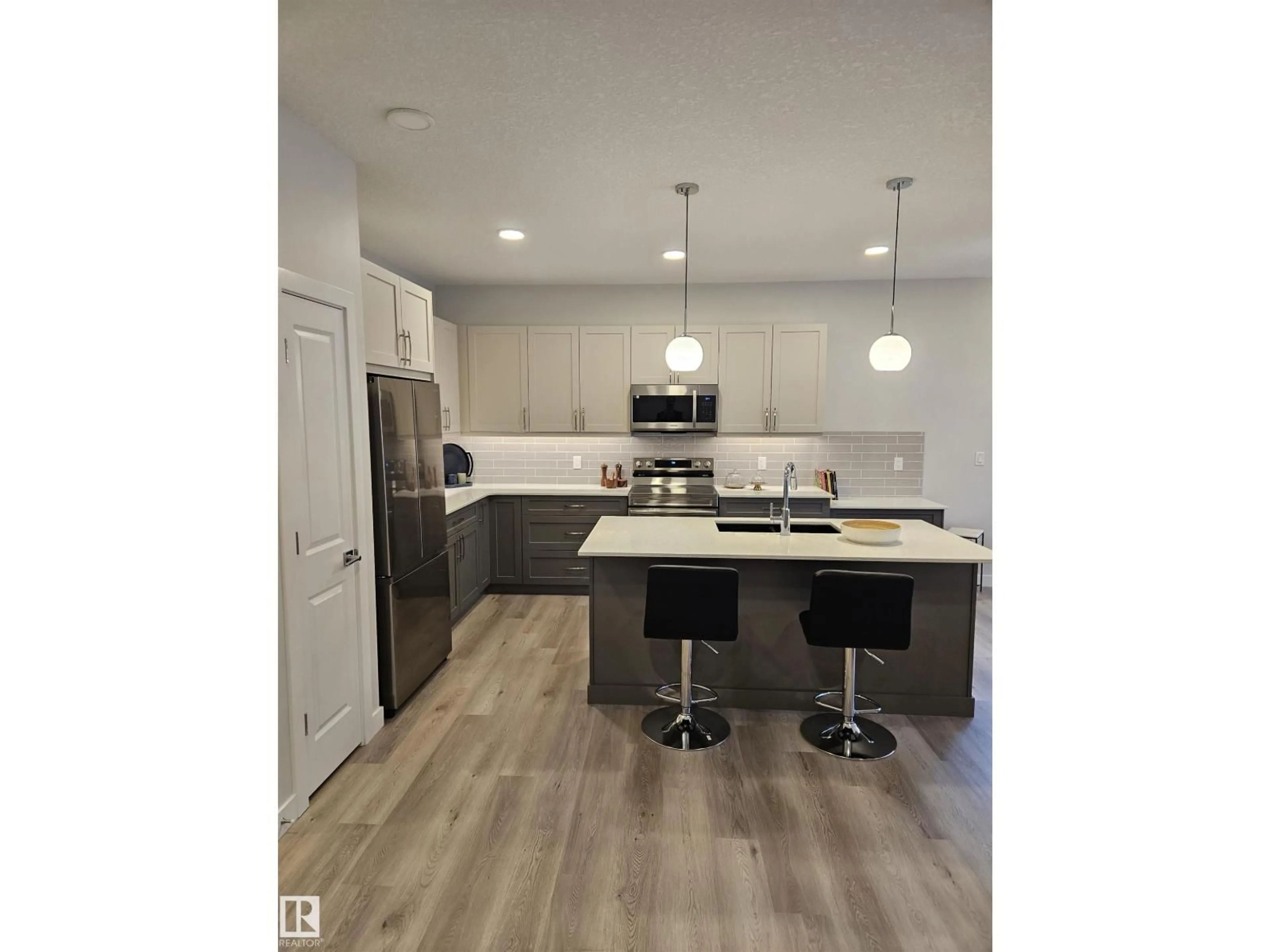 Open concept kitchen, wood/laminate floor for 11 - 44 DALTON LI, Spruce Grove Alberta T7X4C4