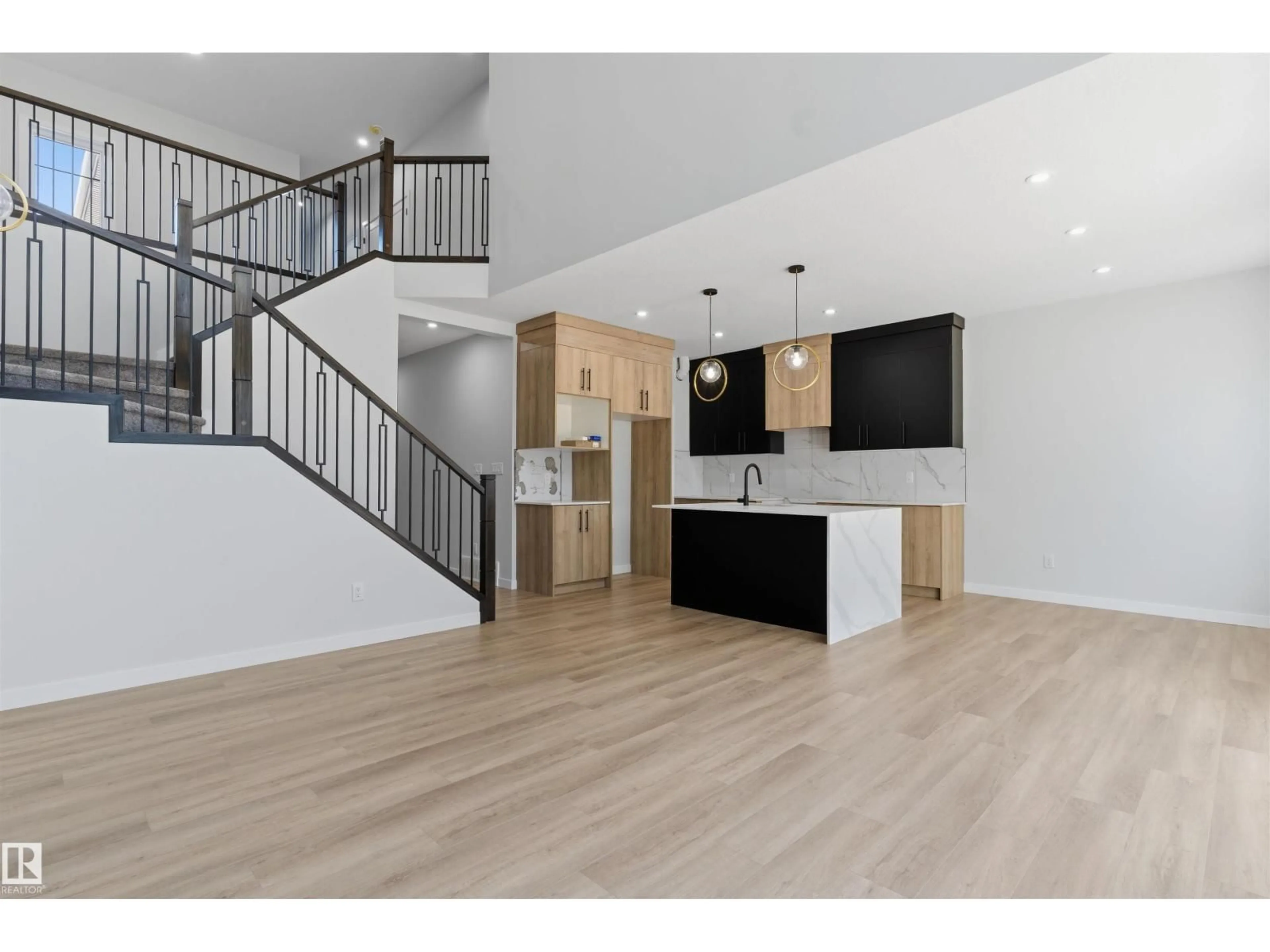 Open concept kitchen, wood/laminate floor for NW - 1721 CROSSBILL LO, Edmonton Alberta T5S0W3