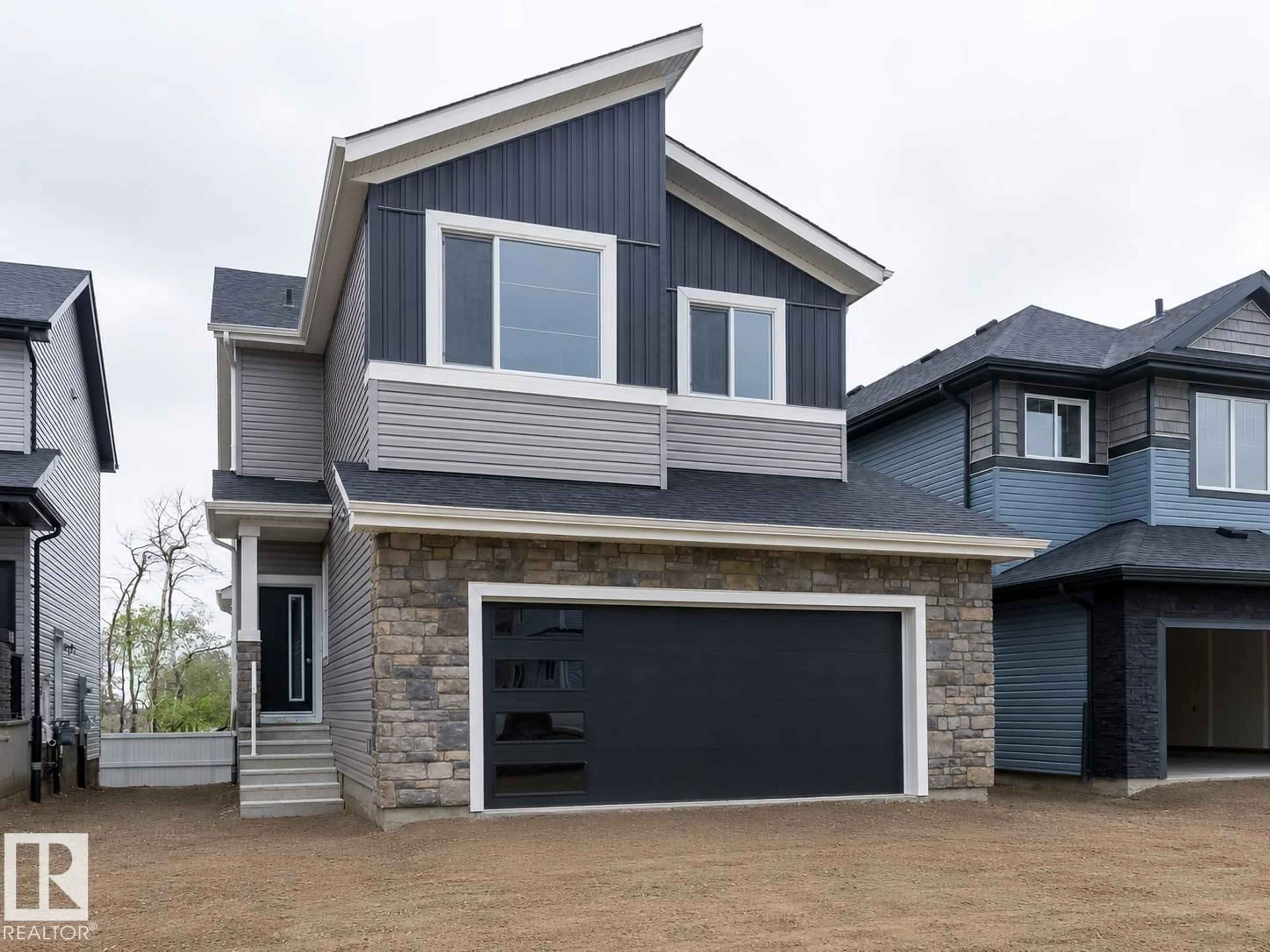 Home with vinyl exterior material, street for 6308 65 AV, Beaumont Alberta T4X0A1