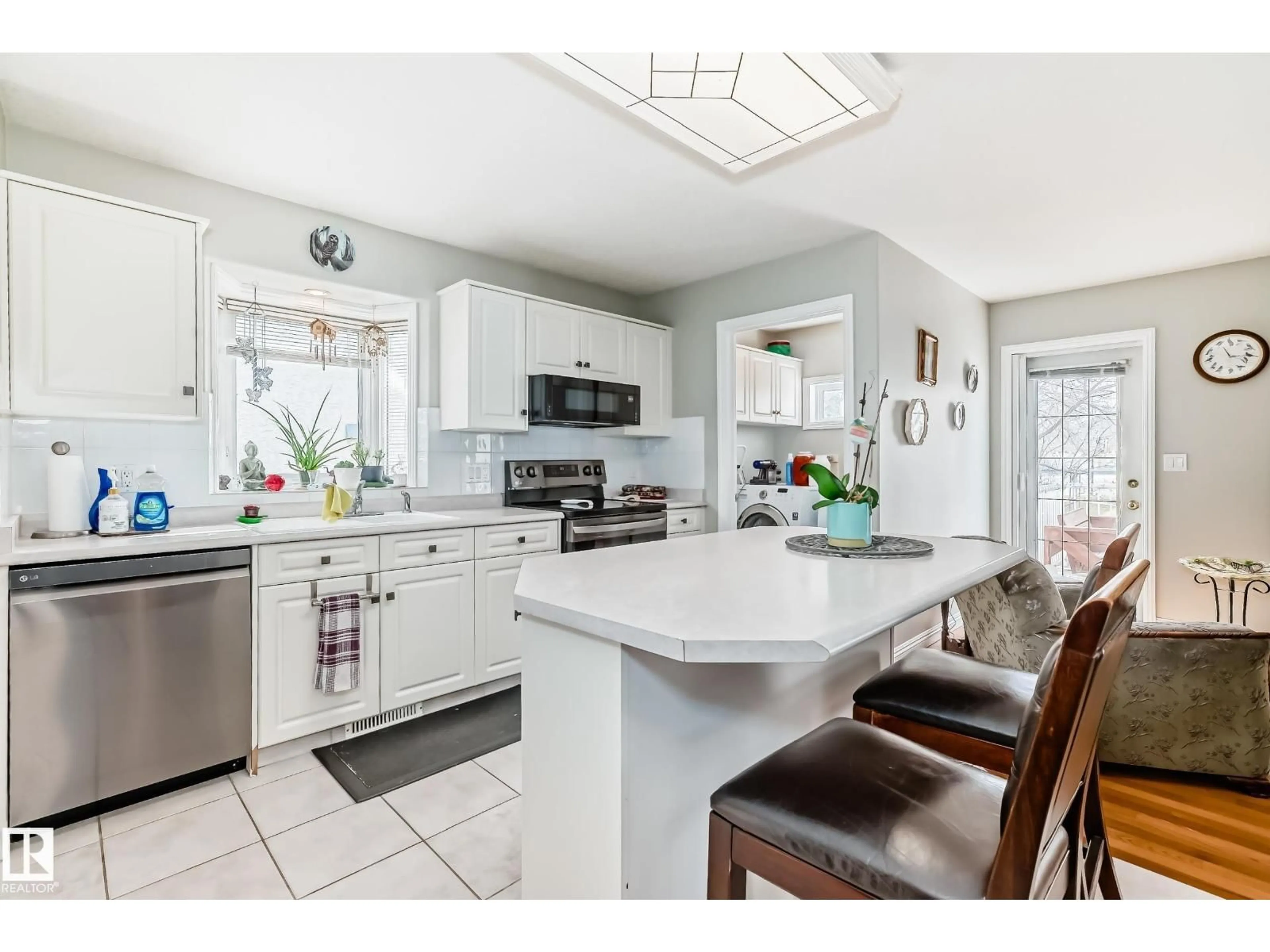 Open concept kitchen, ceramic/tile floor for 168 KULAWY DR, Edmonton Alberta T6L6Z1