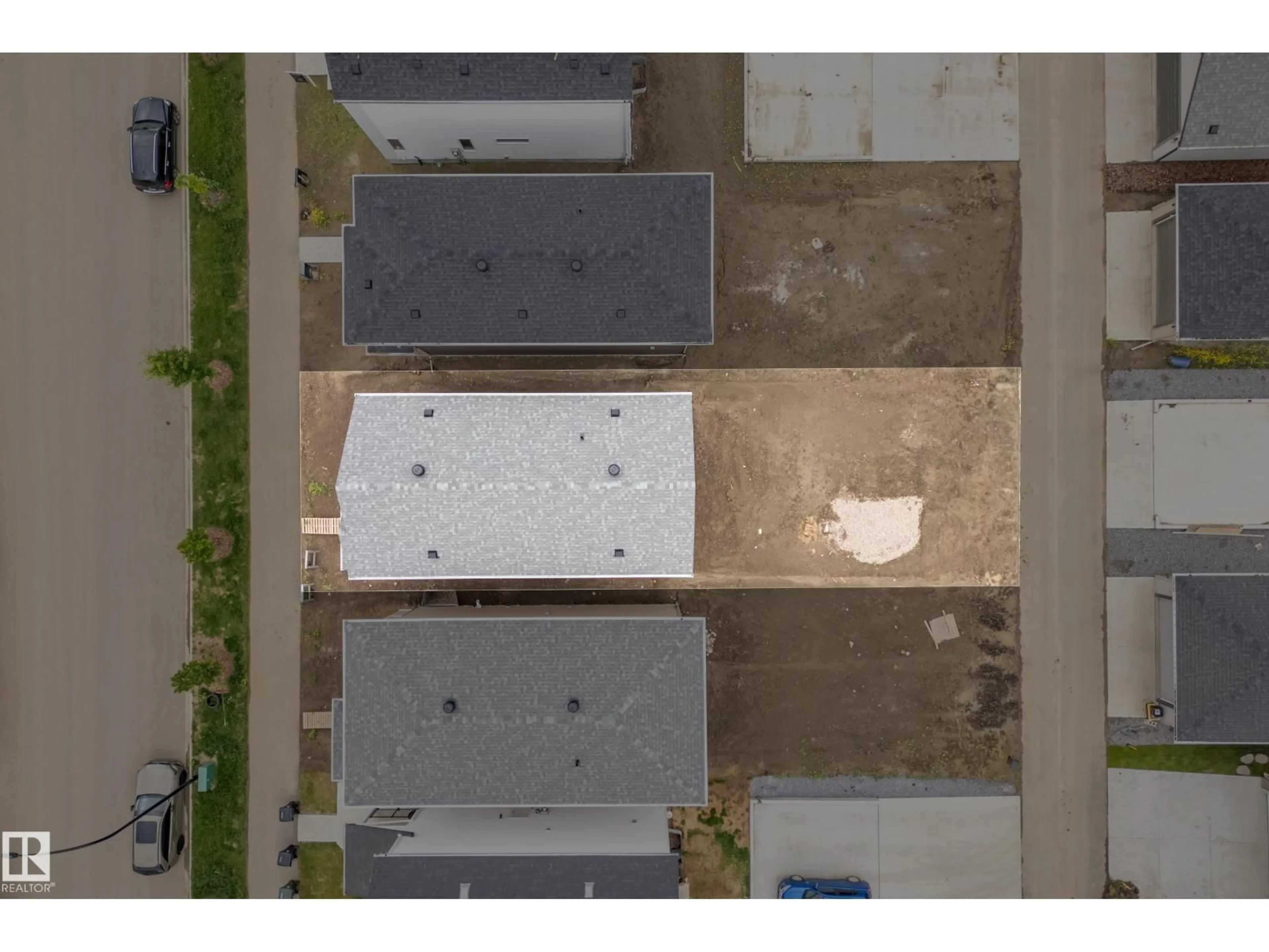 A pic from outside/outdoor area/front of a property/back of a property/a pic from drone, street for 1222 MCLEOD AV, Spruce Grove Alberta T7X4B7
