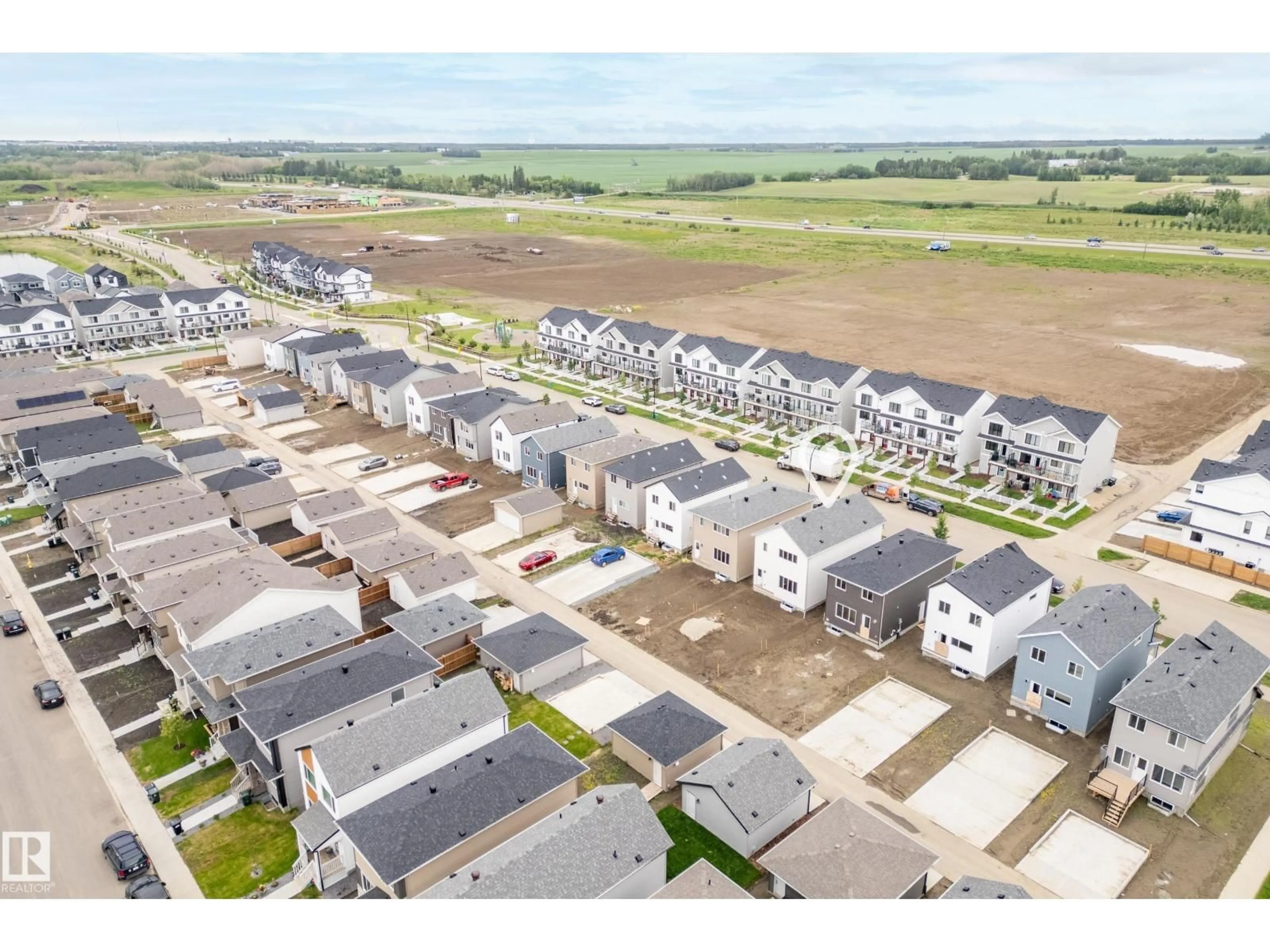 A pic from outside/outdoor area/front of a property/back of a property/a pic from drone, street for 1222 MCLEOD AV, Spruce Grove Alberta T7X4B7