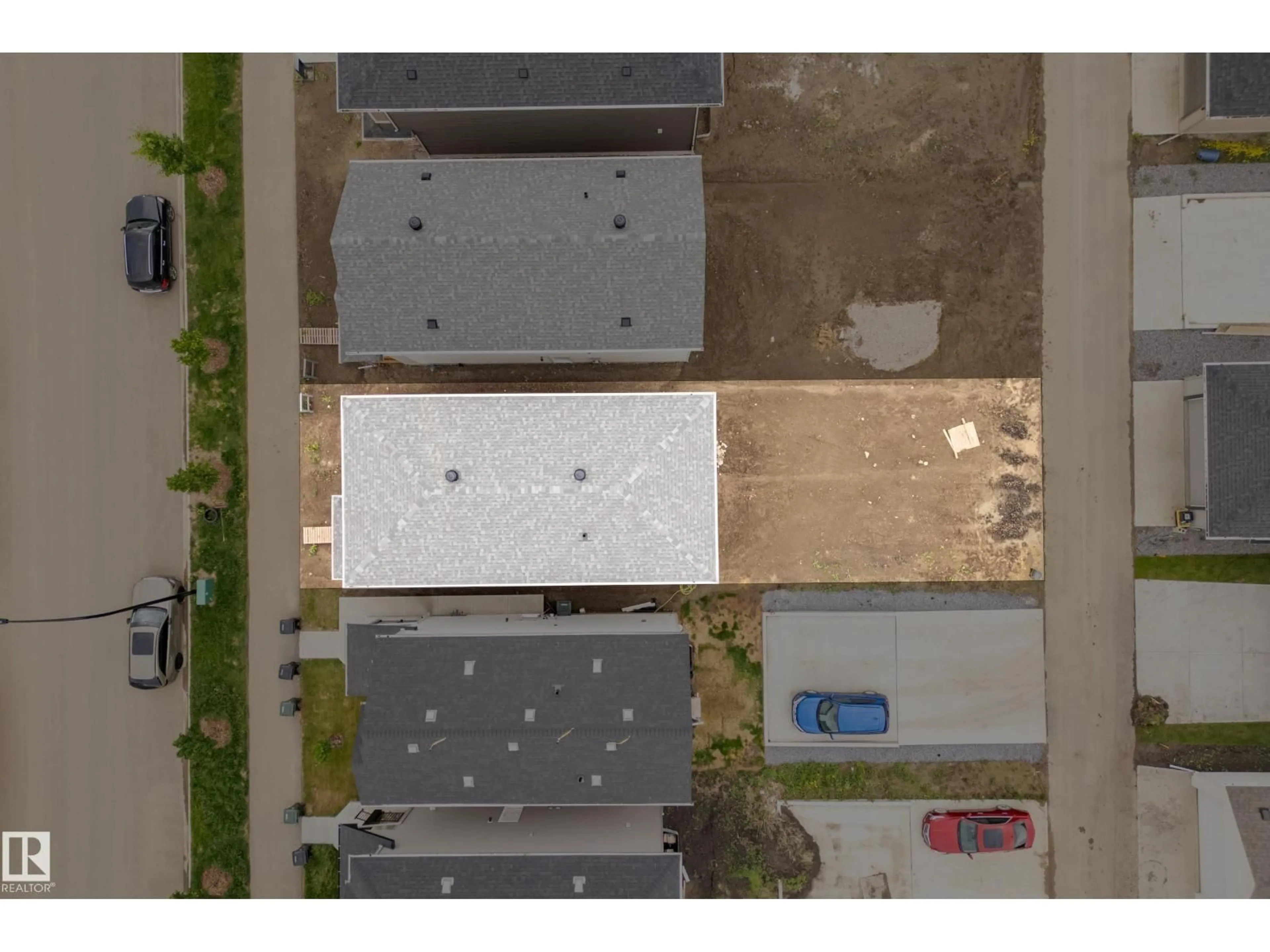 A pic from outside/outdoor area/front of a property/back of a property/a pic from drone, street for 1224 MCLEOD AV, Spruce Grove Alberta T7X4B7