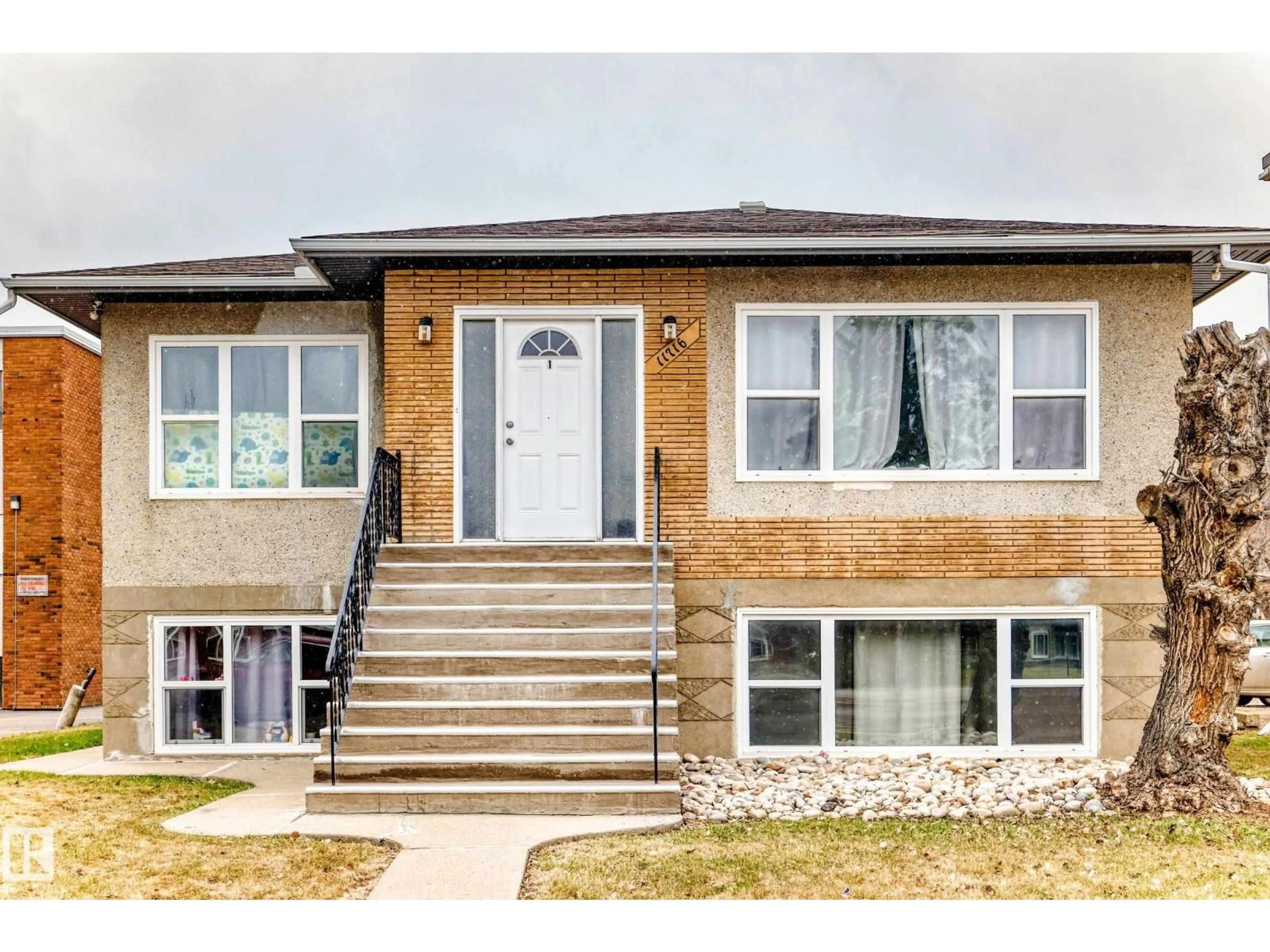 Home with brick exterior material, street for 11716 124 ST, Edmonton Alberta T5M0K9