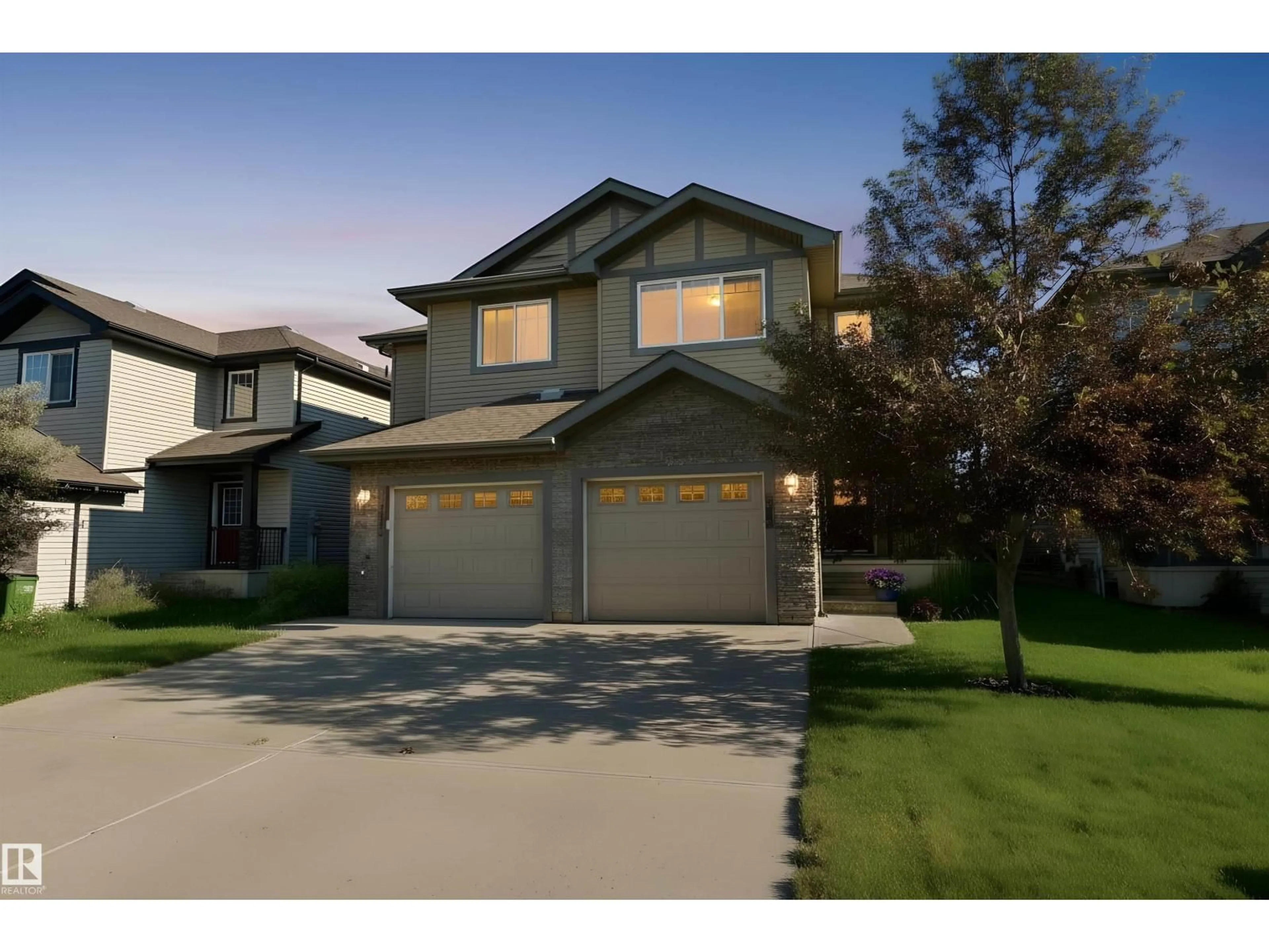 Home with vinyl exterior material, street for 2340 CASSELMAN CR, Edmonton Alberta T6W0W1