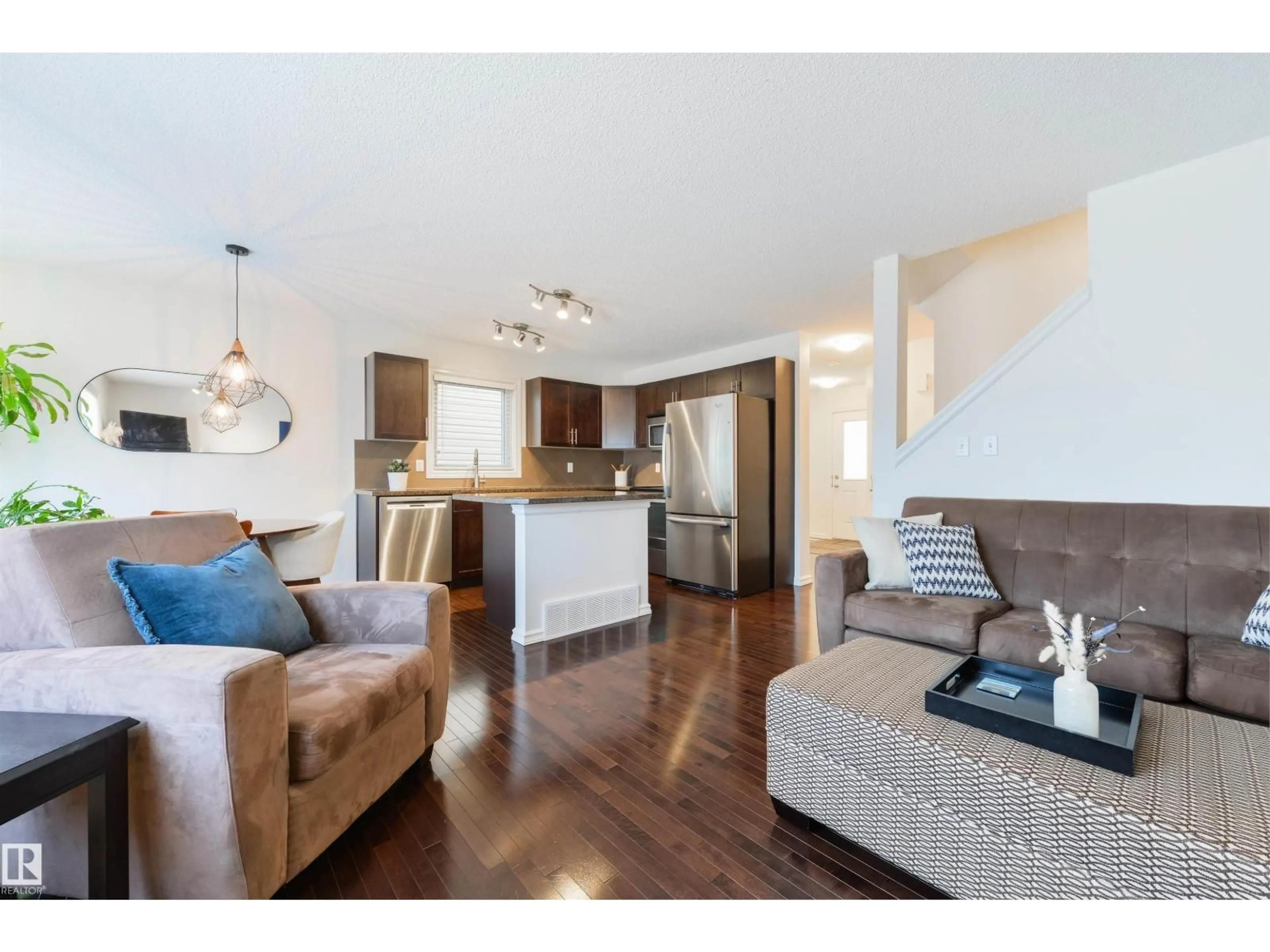 Open concept kitchen, wood/laminate floor for 2340 CASSELMAN CR, Edmonton Alberta T6W0W1