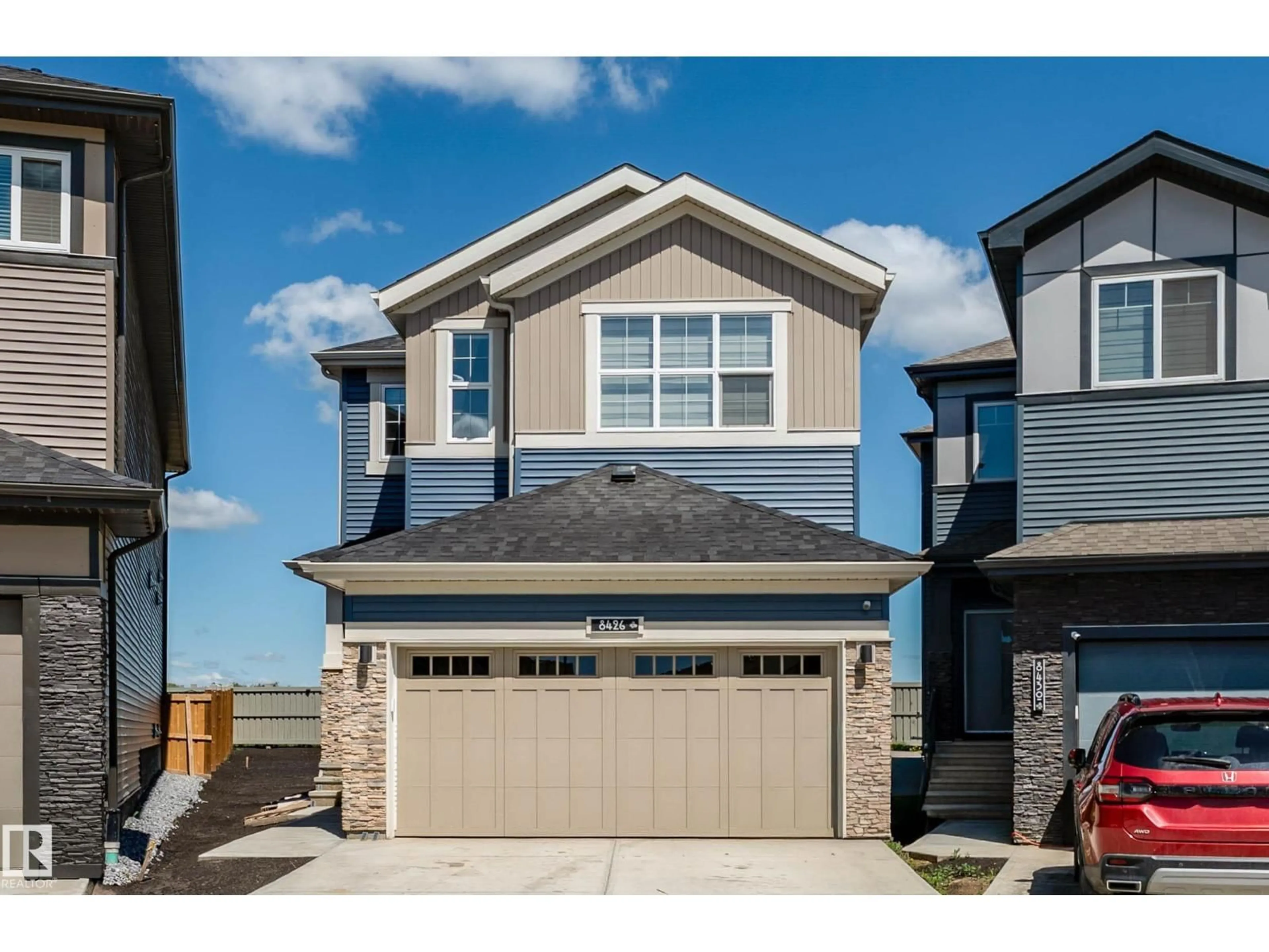 Home with vinyl exterior material, street for 8426 228A ST, Edmonton Alberta T5T4A3