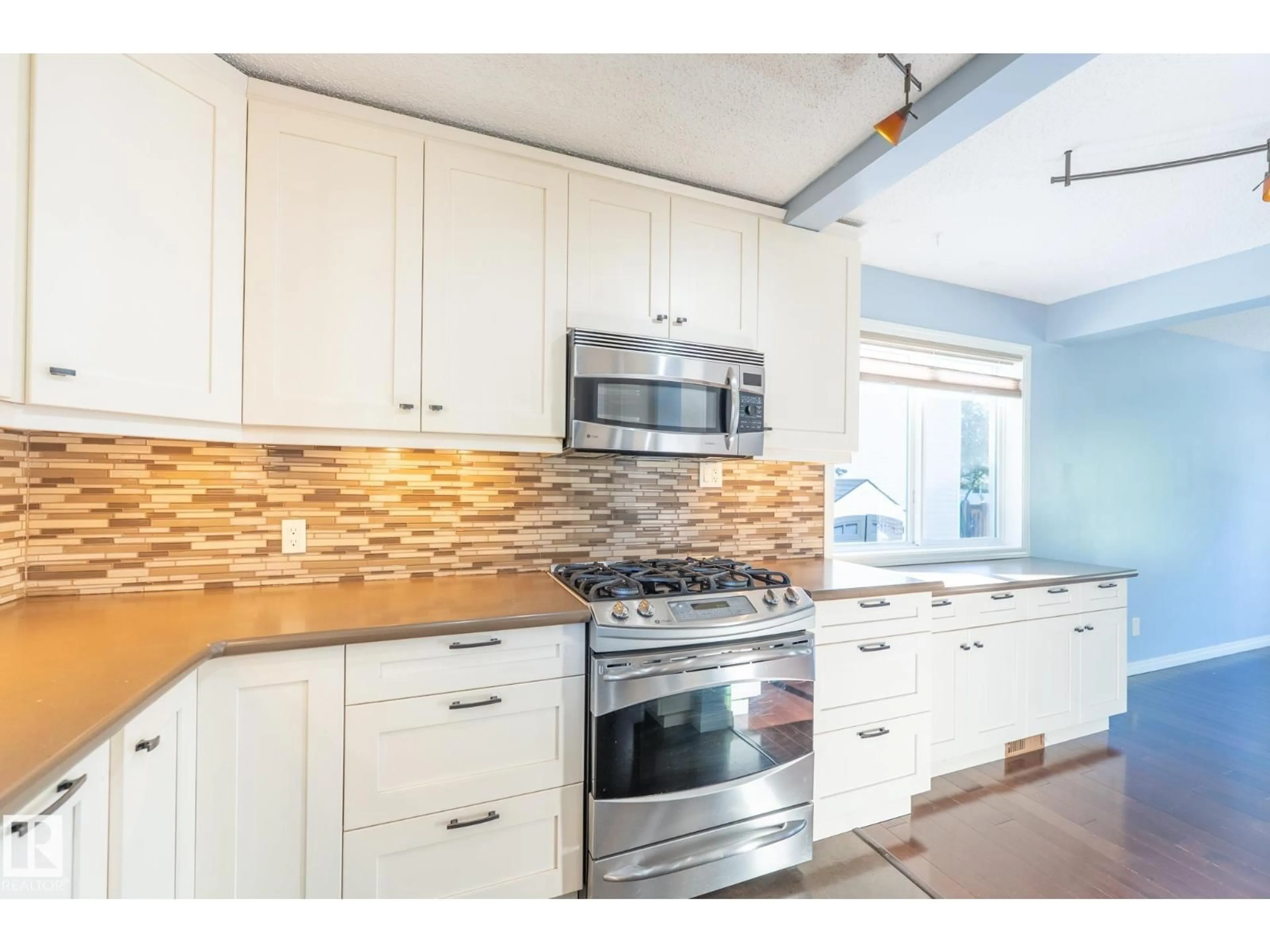 Open concept kitchen, ceramic/tile floor for 18289 74 AV, Edmonton Alberta T5T2G6
