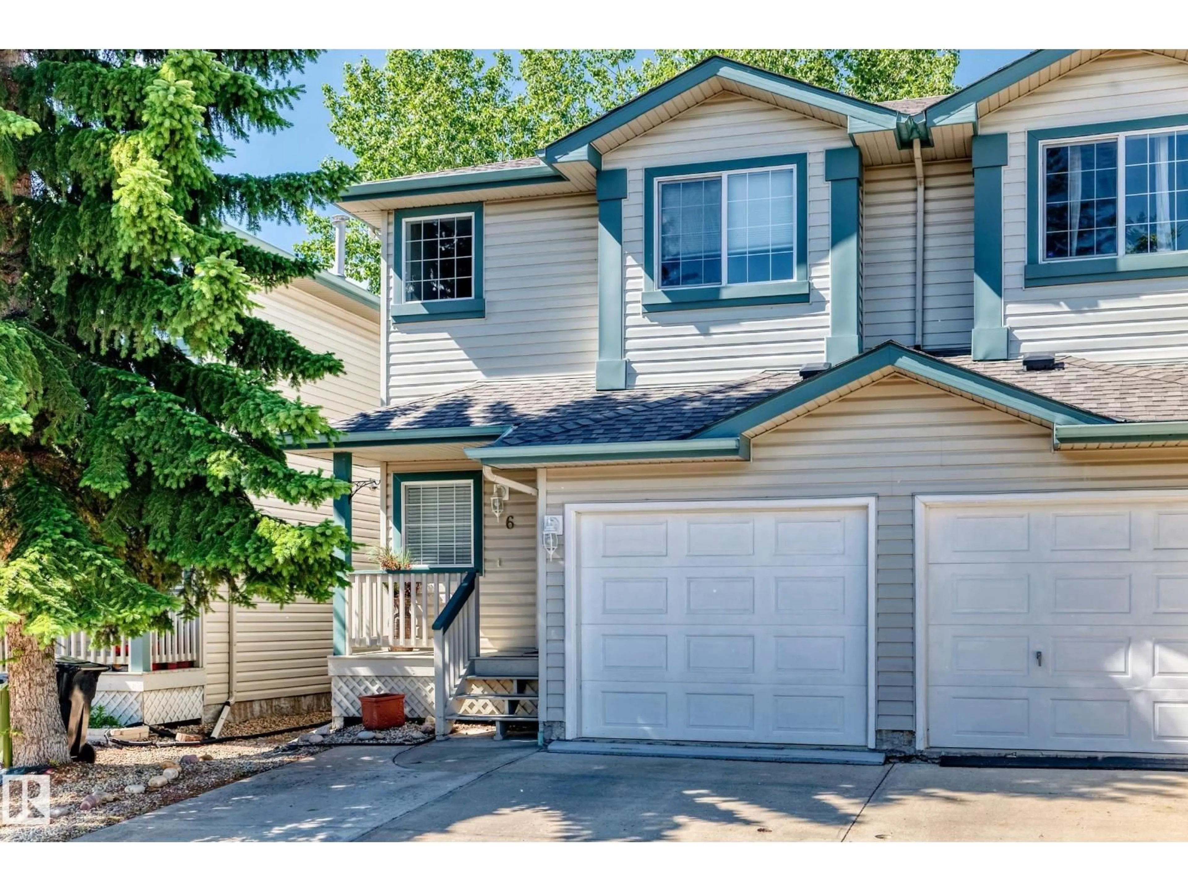 Home with vinyl exterior material, street for #6 - 14803 MILLER BV, Edmonton Alberta T5Y3A4