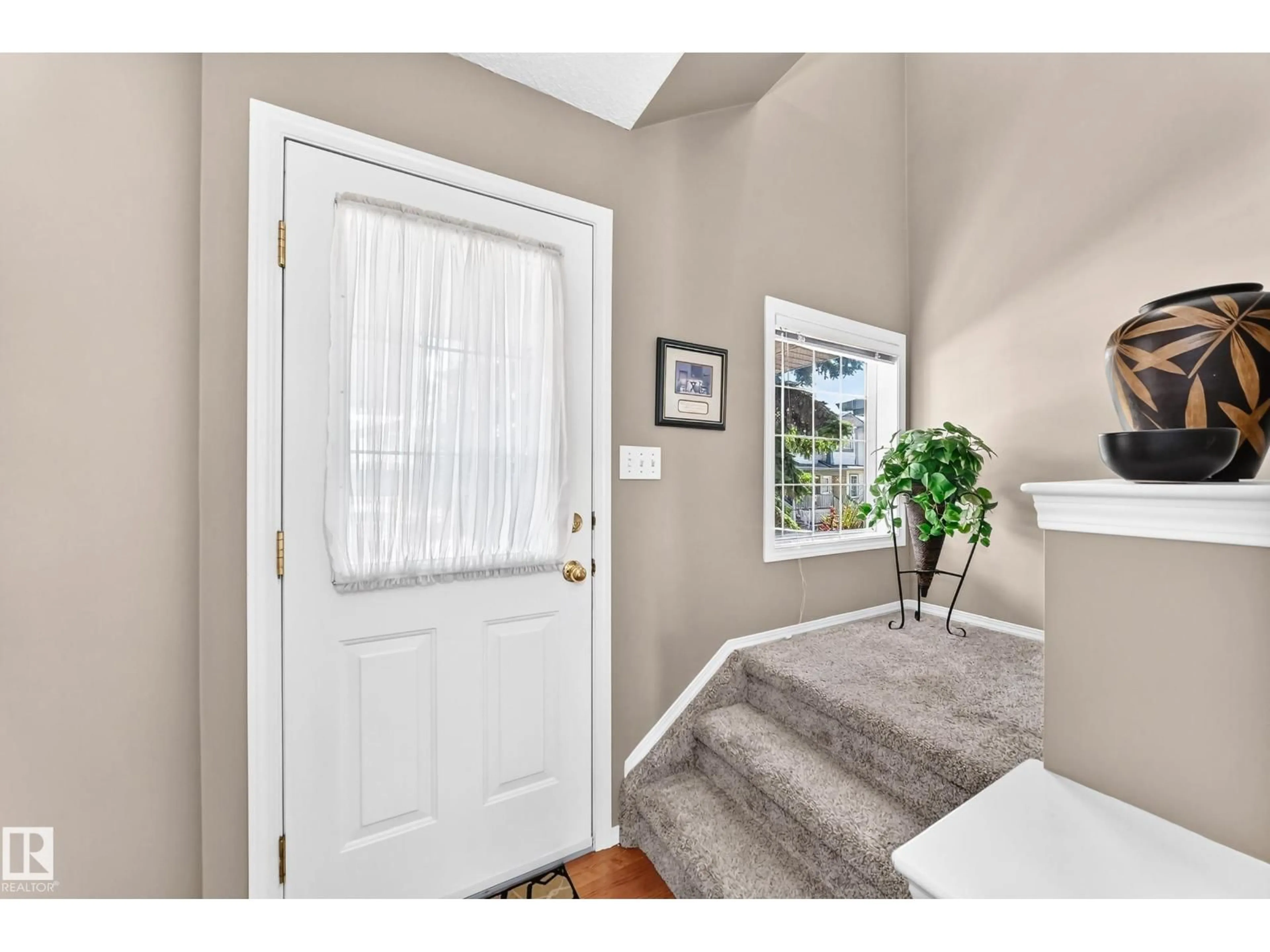 Indoor entryway for #6 - 14803 MILLER BV, Edmonton Alberta T5Y3A4
