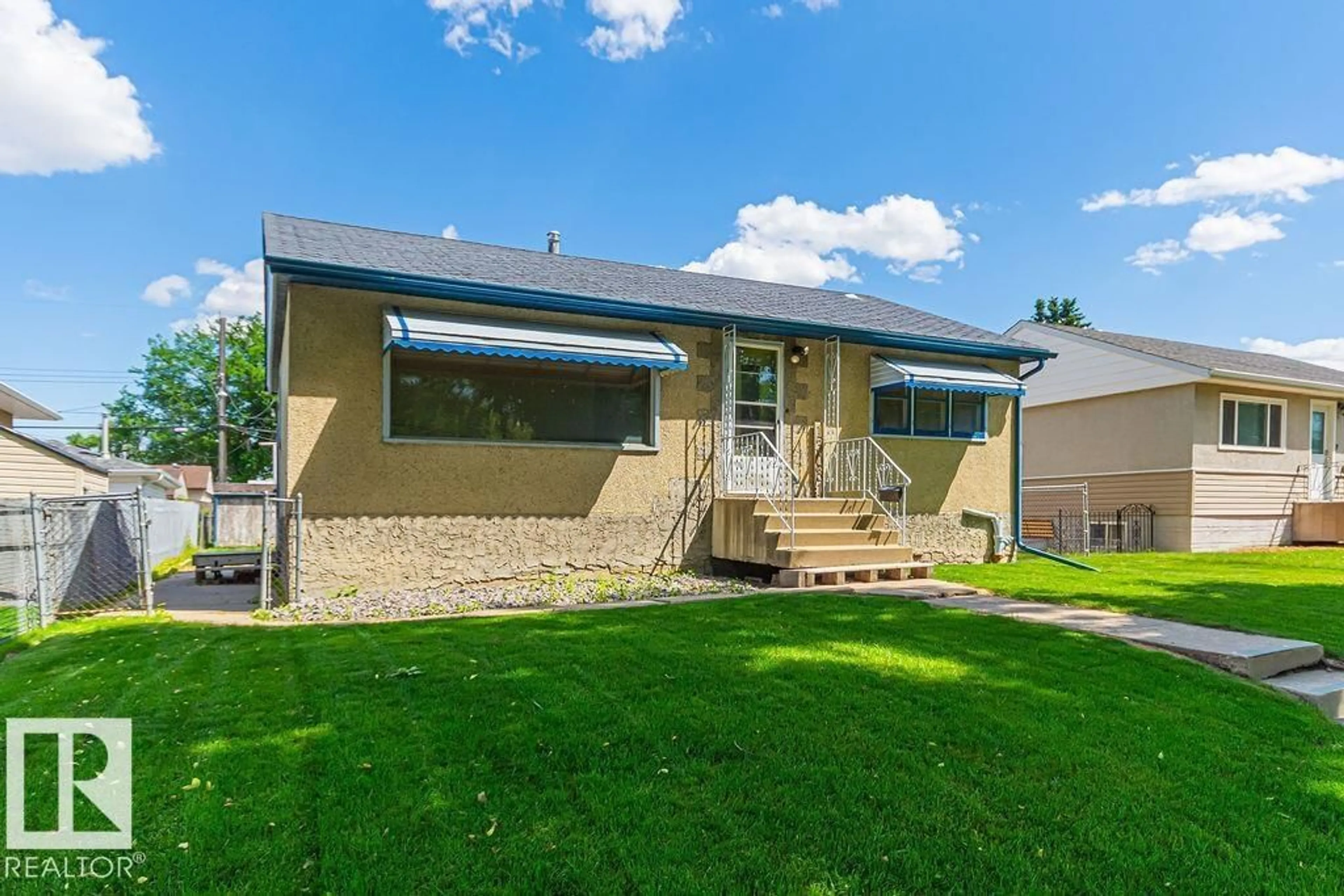 Home with vinyl exterior material, street for NW - 13031 63 ST, Edmonton Alberta T5A0W5