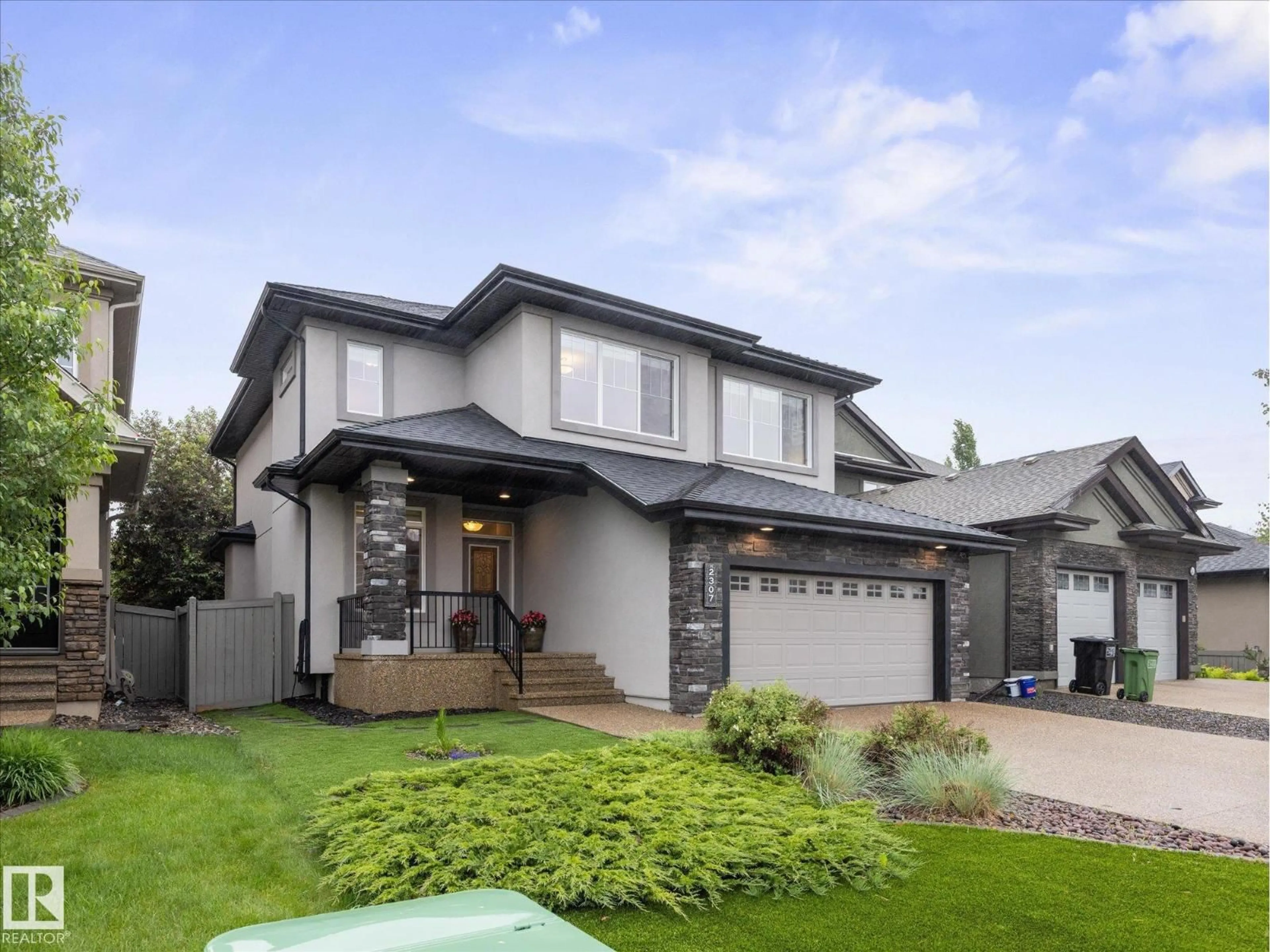 Home with vinyl exterior material, street for 2307 WARRY CO SW, Edmonton Alberta T6W0N9