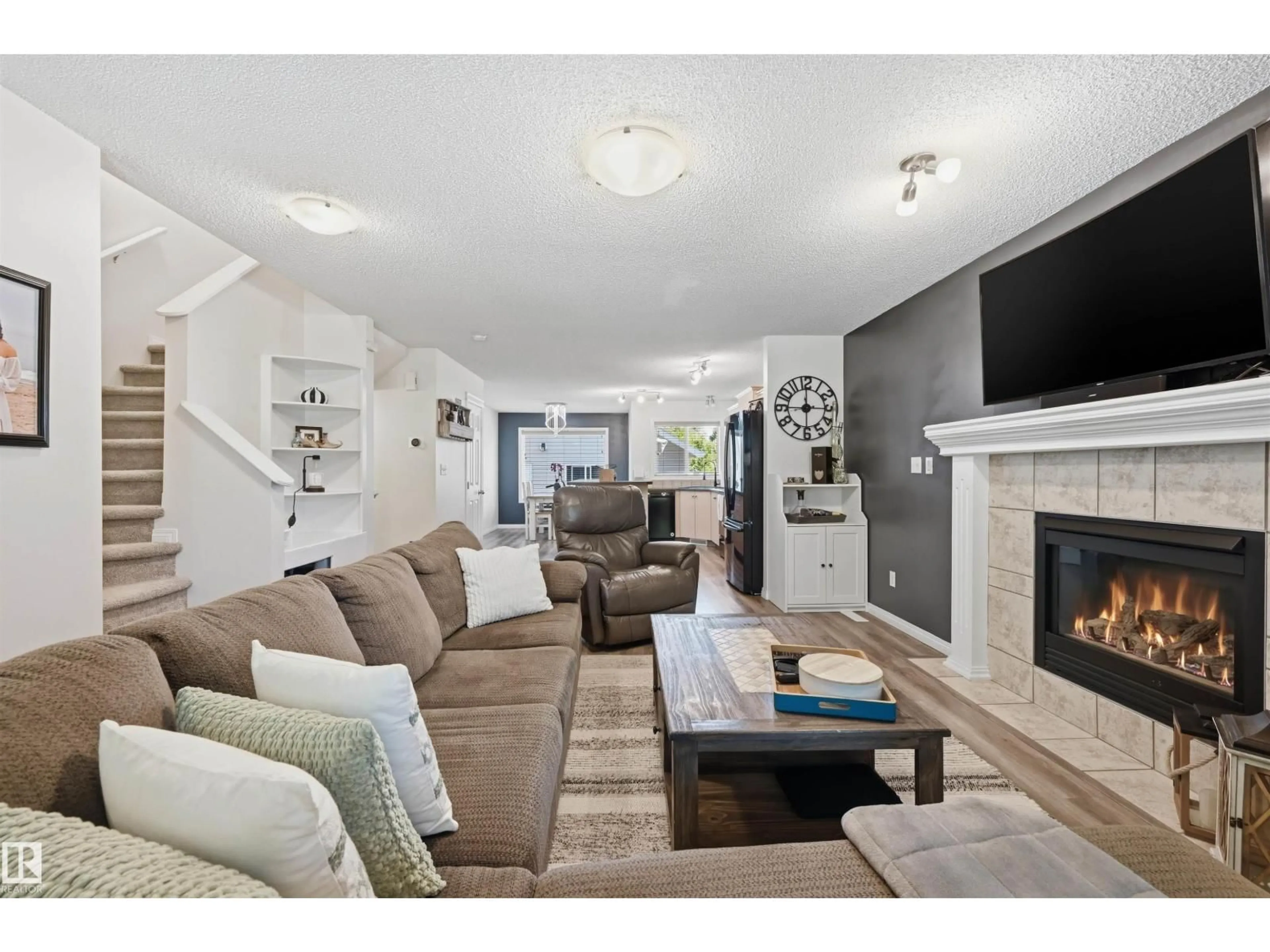 Living room with furniture, unknown for SW - 12028 18 AV, Edmonton Alberta T6W1W2