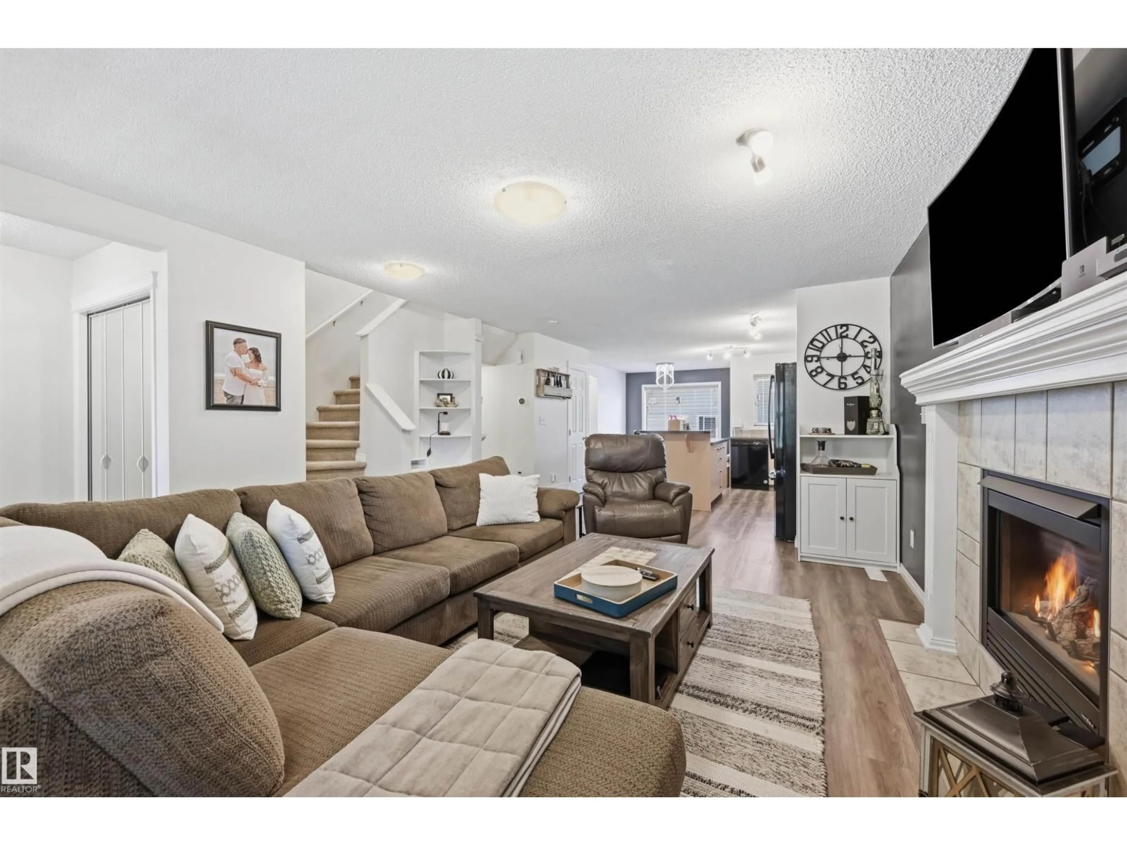 Living room with furniture, unknown for SW - 12028 18 AV, Edmonton Alberta T6W1W2