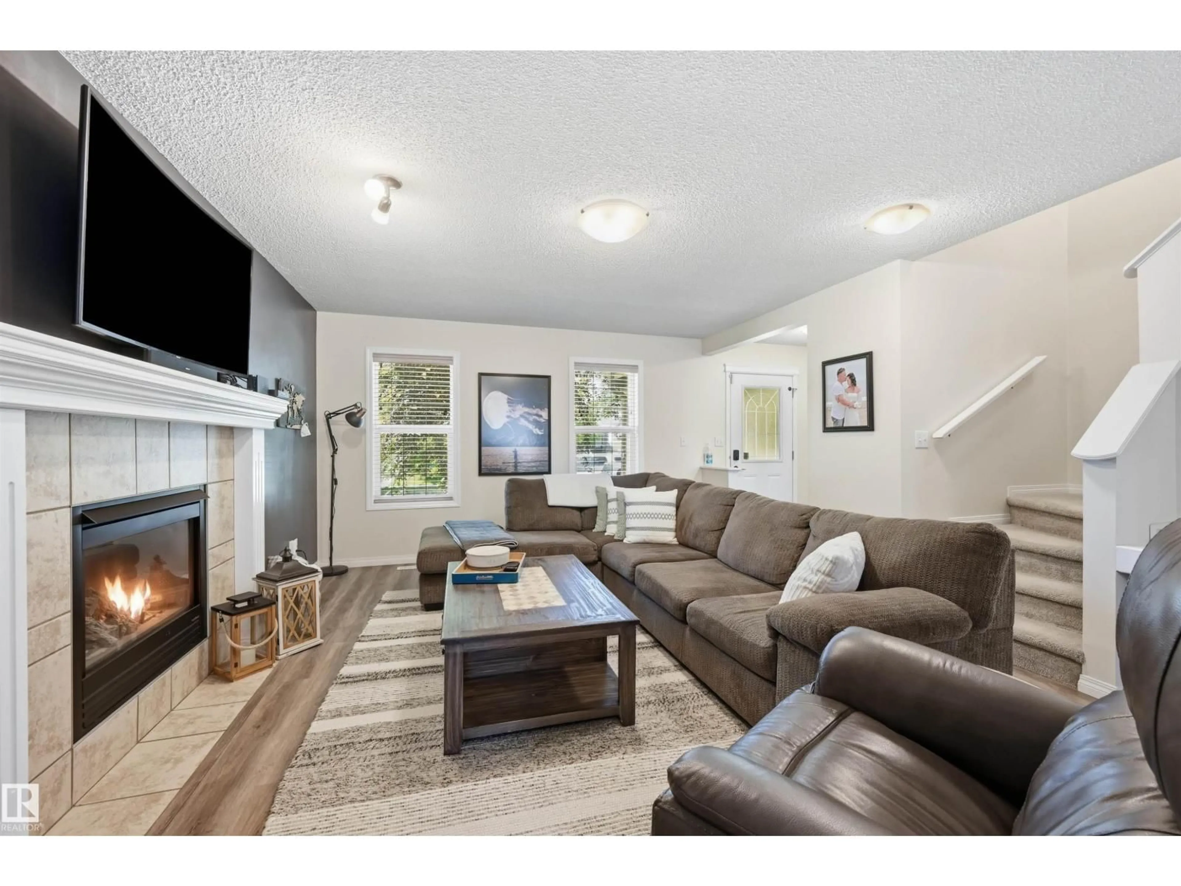 Living room with furniture, unknown for SW - 12028 18 AV, Edmonton Alberta T6W1W2