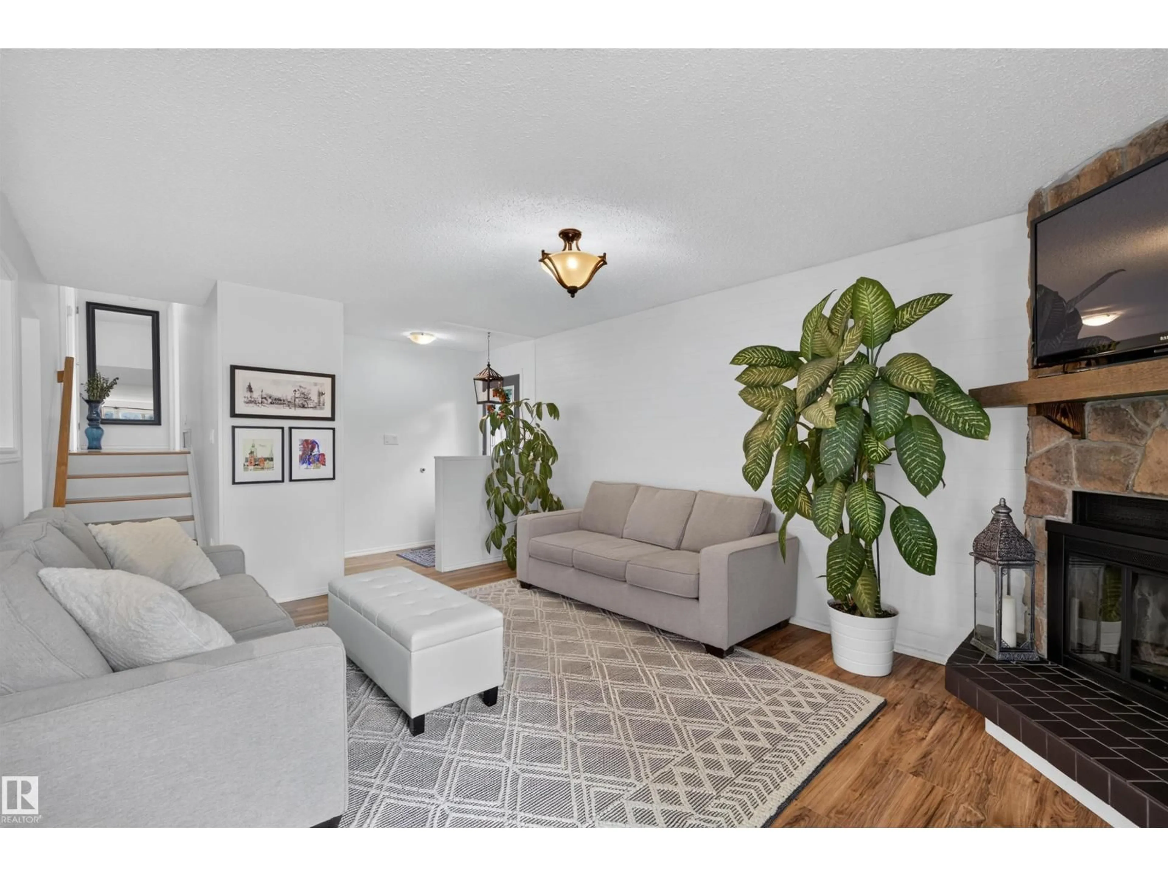 Living room with furniture, unknown for 244 KNOTTWOOD RD, Edmonton Alberta T6K1Y4