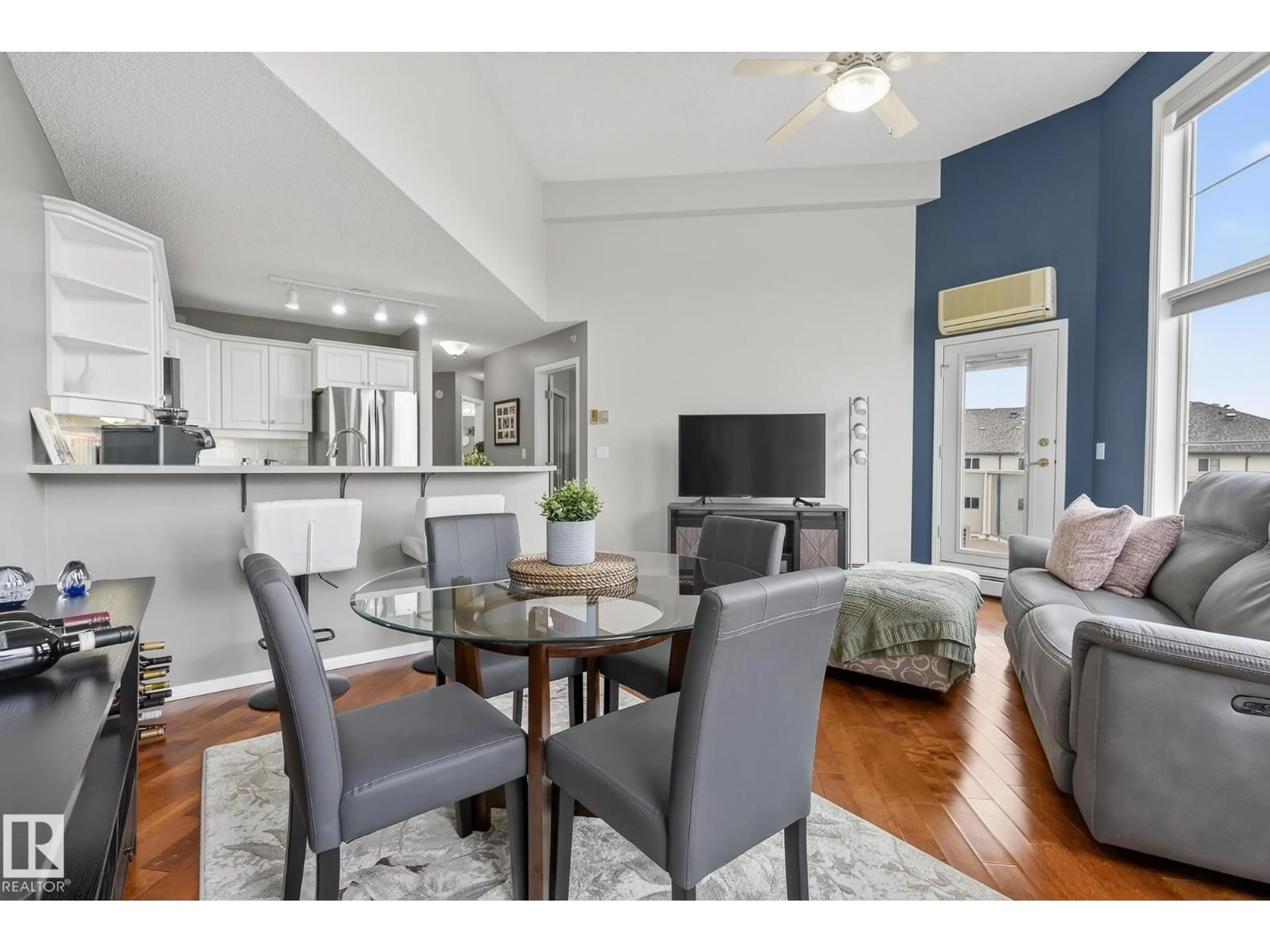 Living room with furniture, wood/laminate floor for 421 - 9730 174 ST, Edmonton Alberta T5T6J4
