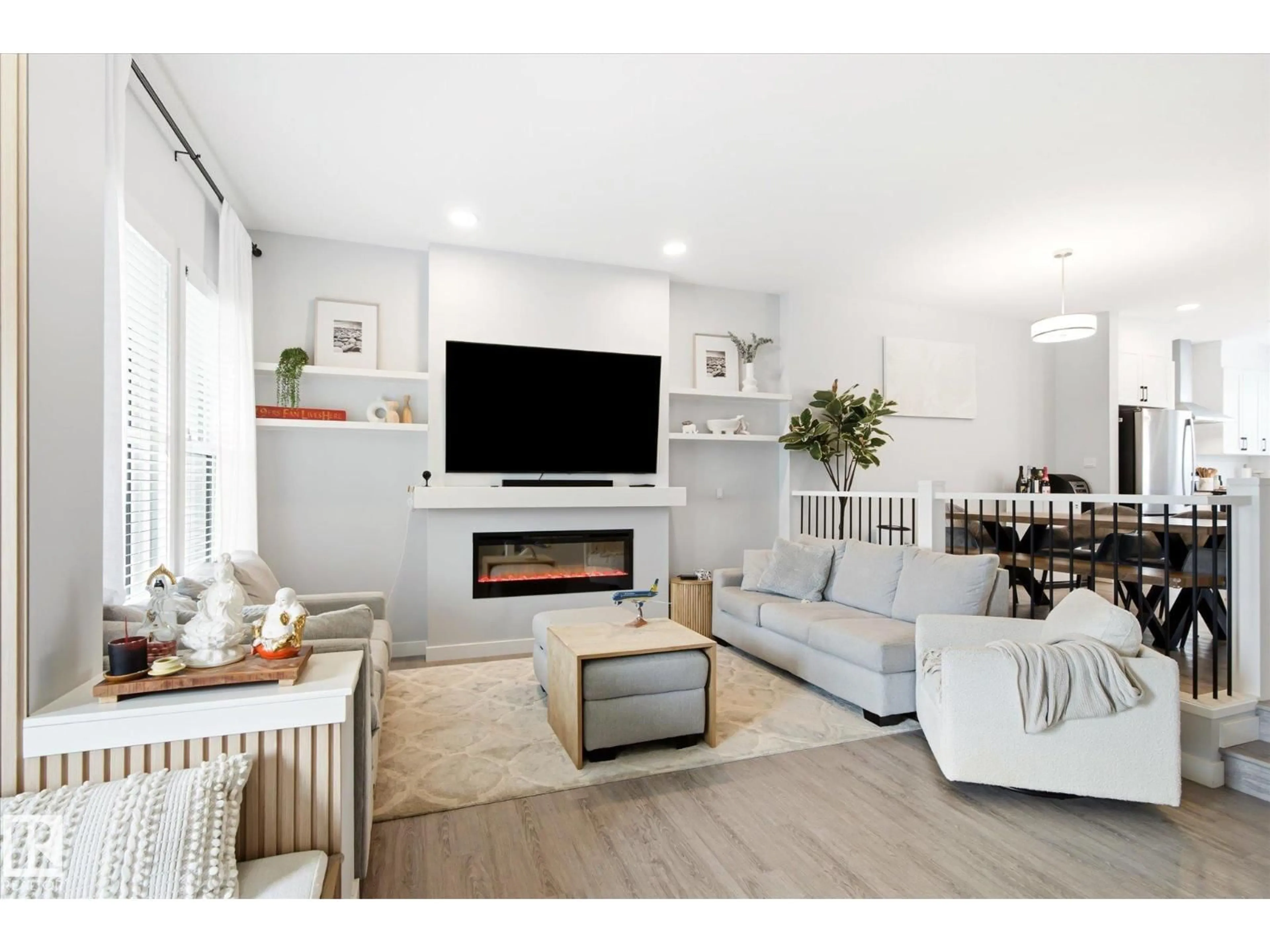 Living room with furniture, wood/laminate floor for NW - 3415 ERLANGER BN, Edmonton Alberta T6M3A5