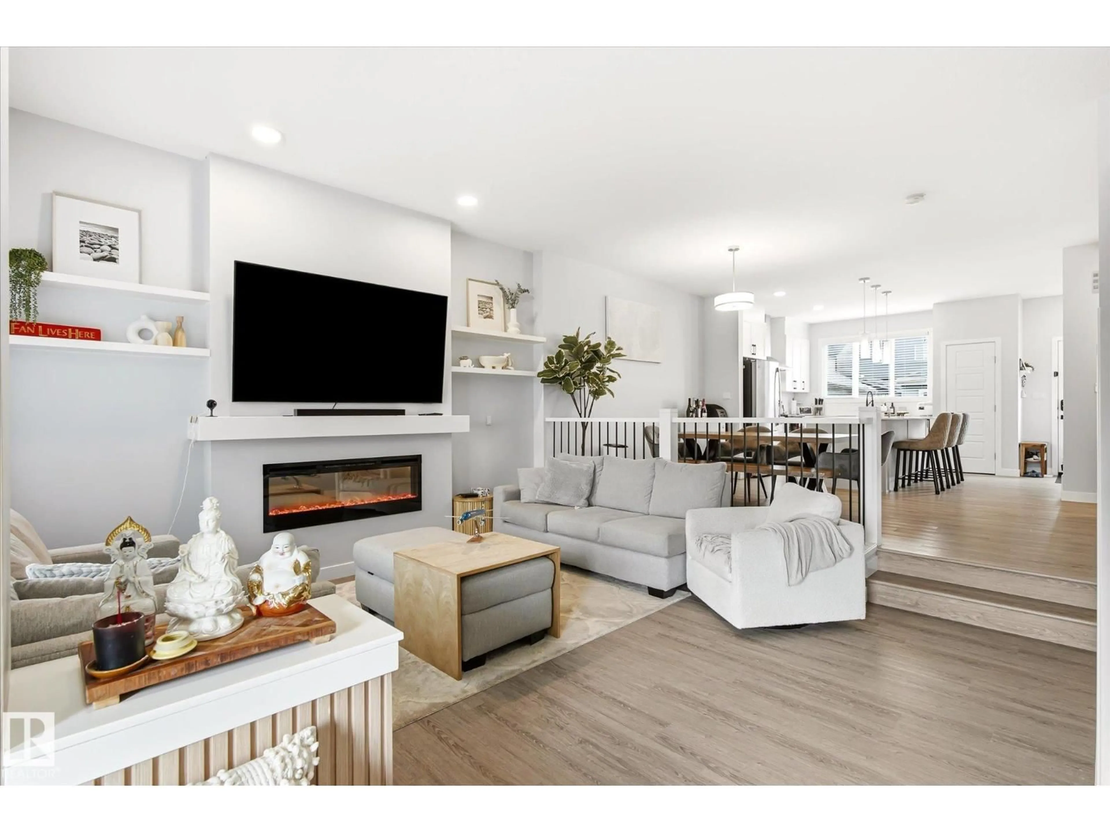 Living room with furniture, wood/laminate floor for NW - 3415 ERLANGER BN, Edmonton Alberta T6M3A5