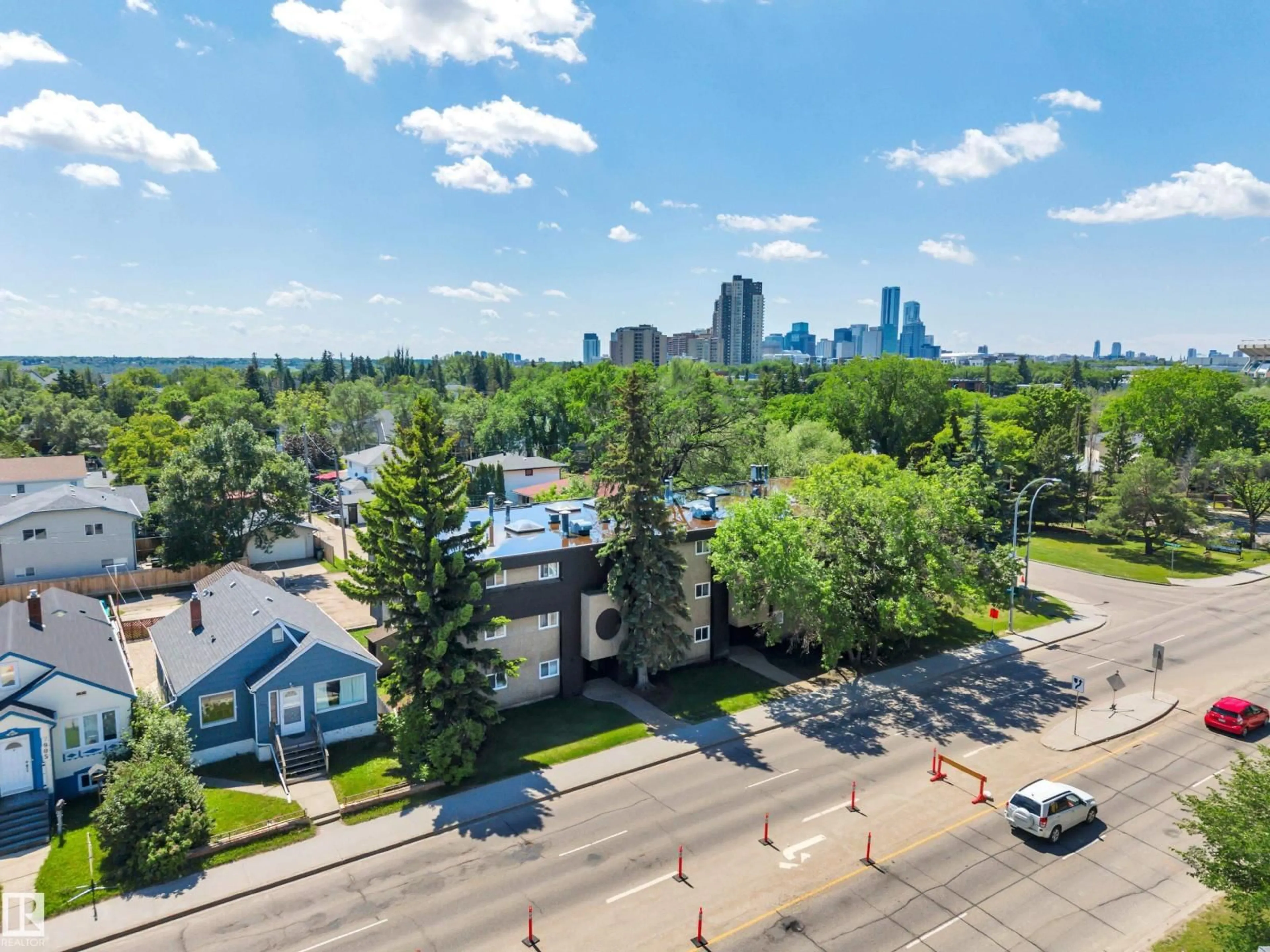 A pic from outside/outdoor area/front of a property/back of a property/a pic from drone, city buildings view from balcony for 201 - 7915 112 AV NW, Edmonton Alberta T5B0E7