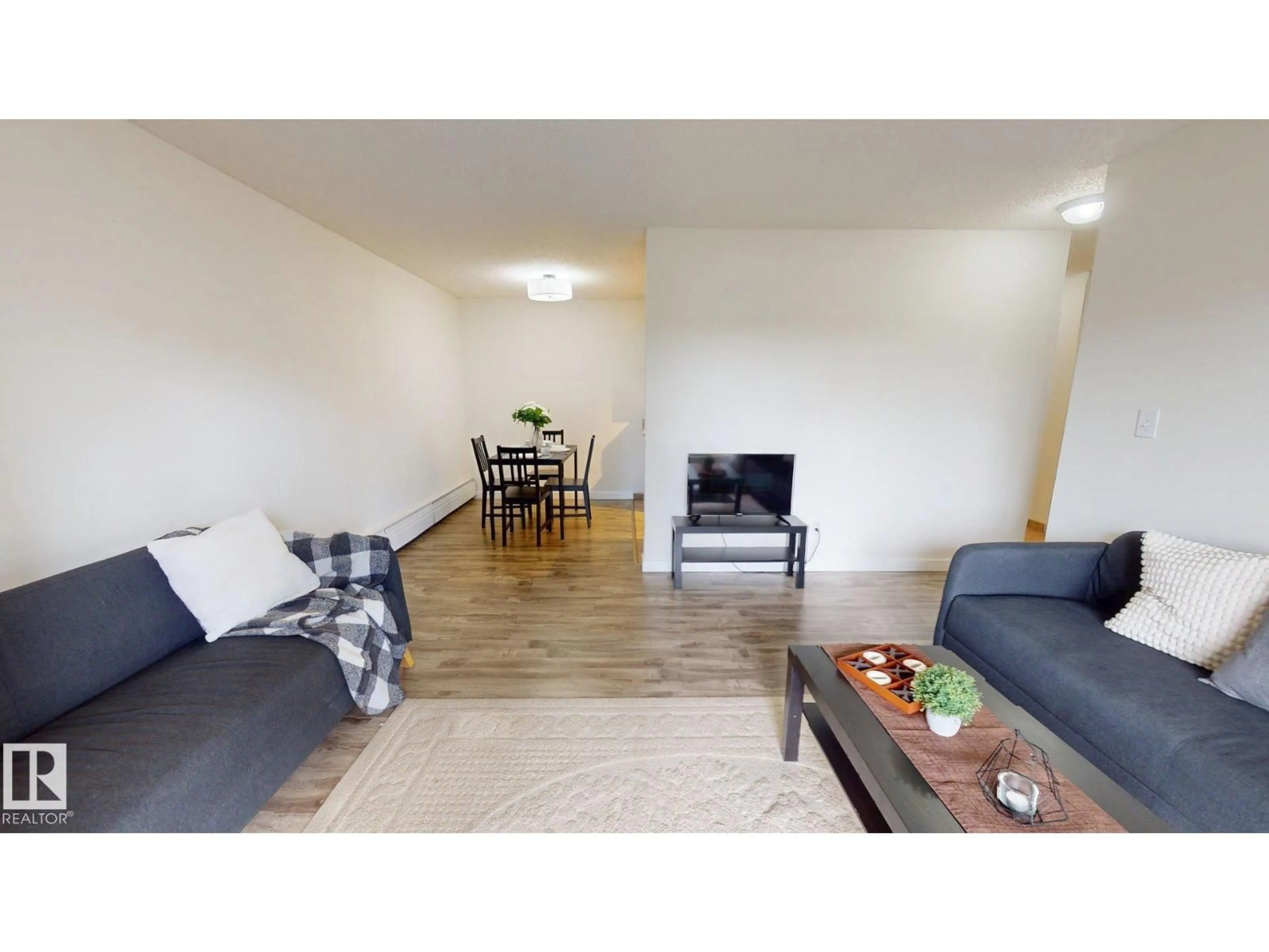 Living room with furniture, unknown for 207 - 11224 116 ST NW, Edmonton Alberta T5G2W1