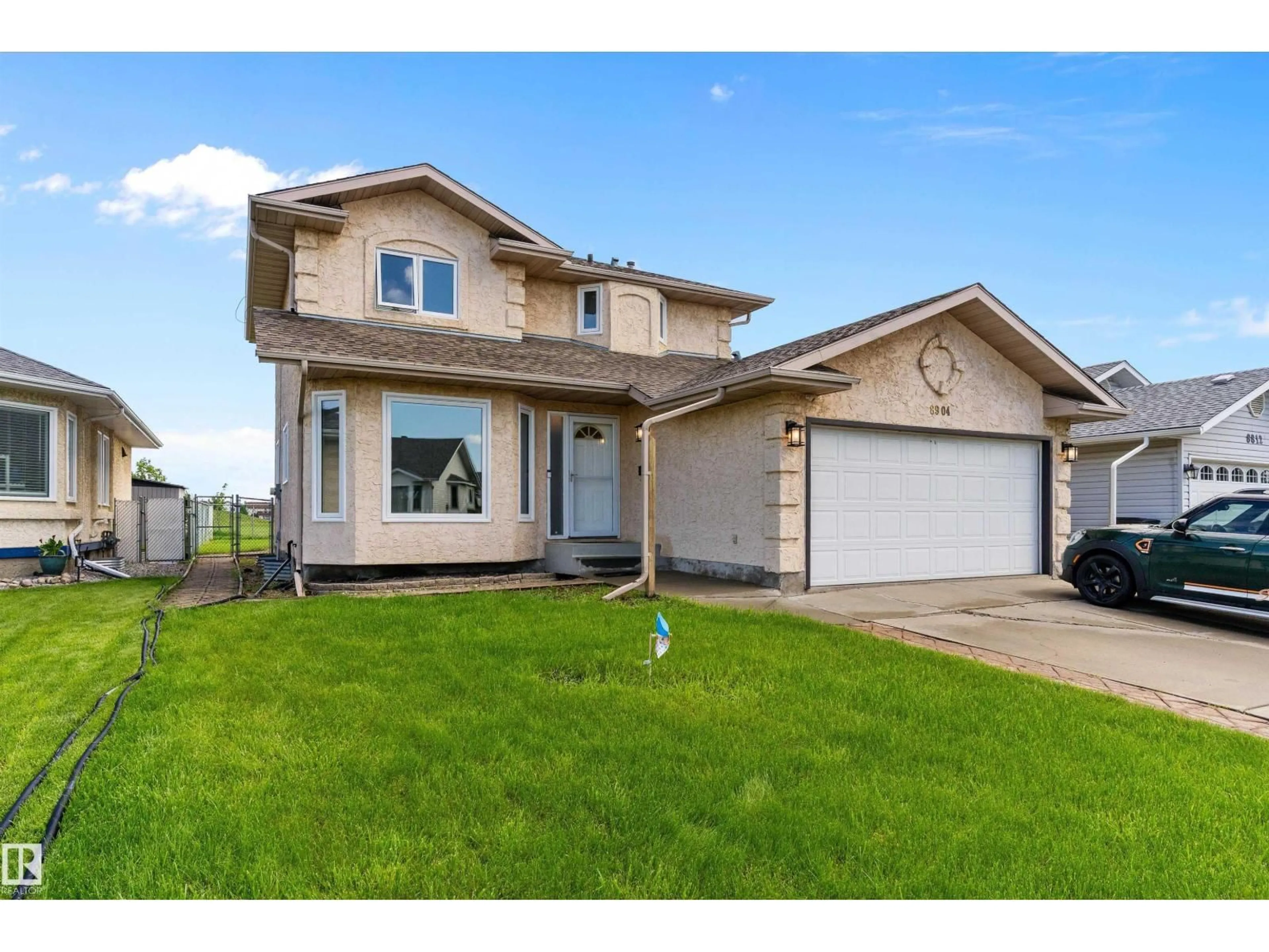 Home with vinyl exterior material, street for 8904 170A AV, Edmonton Alberta T5Z2Y7