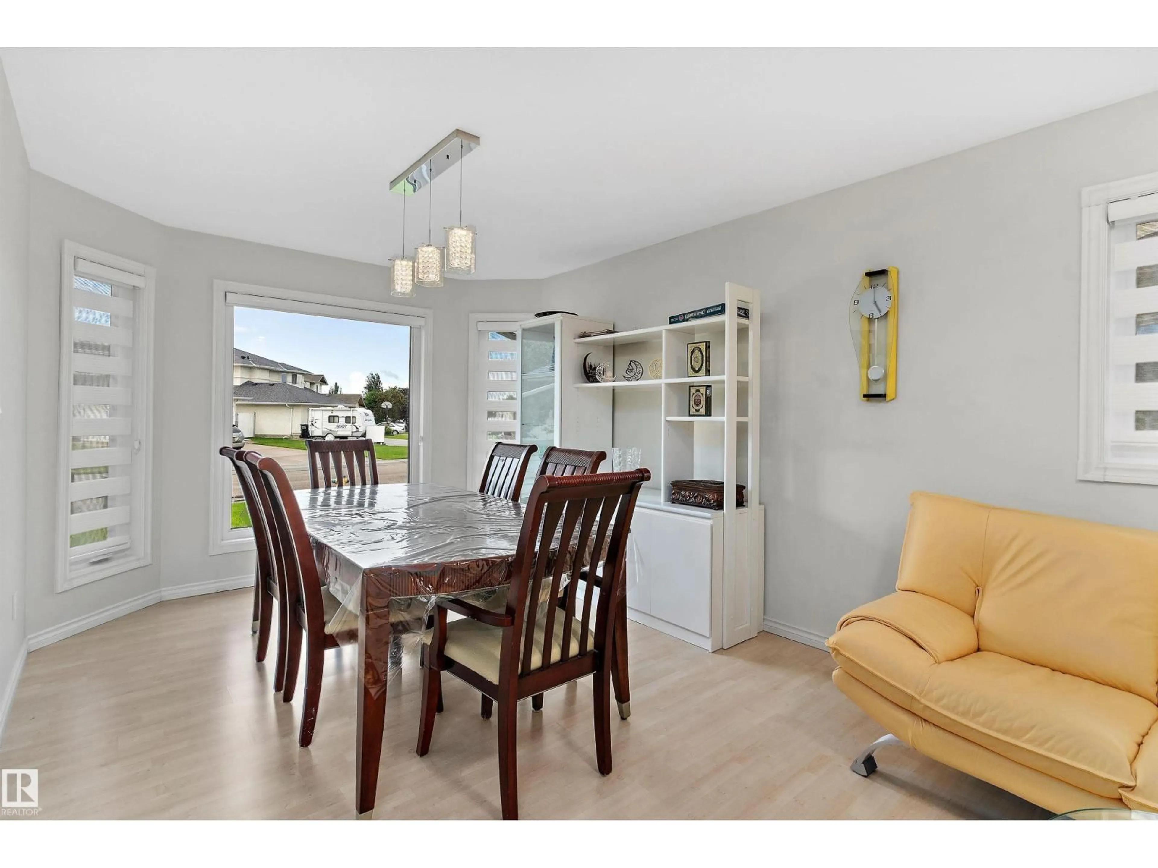 Dining room, wood/laminate floor for 8904 170A AV, Edmonton Alberta T5Z2Y7