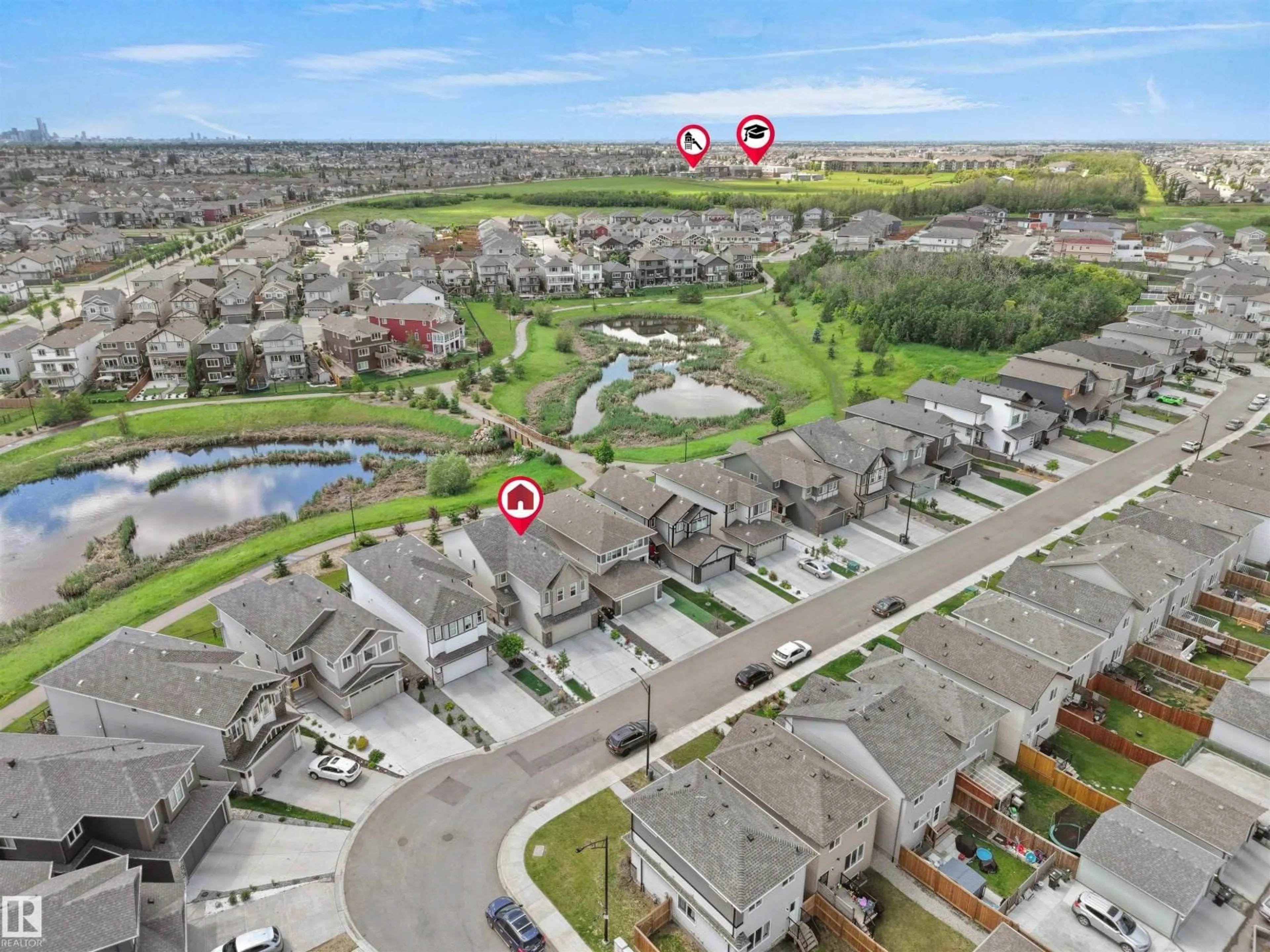 A pic from outside/outdoor area/front of a property/back of a property/a pic from drone, water/lake/river/ocean view for NW - 4615 175 AV, Edmonton Alberta T5Y4A1
