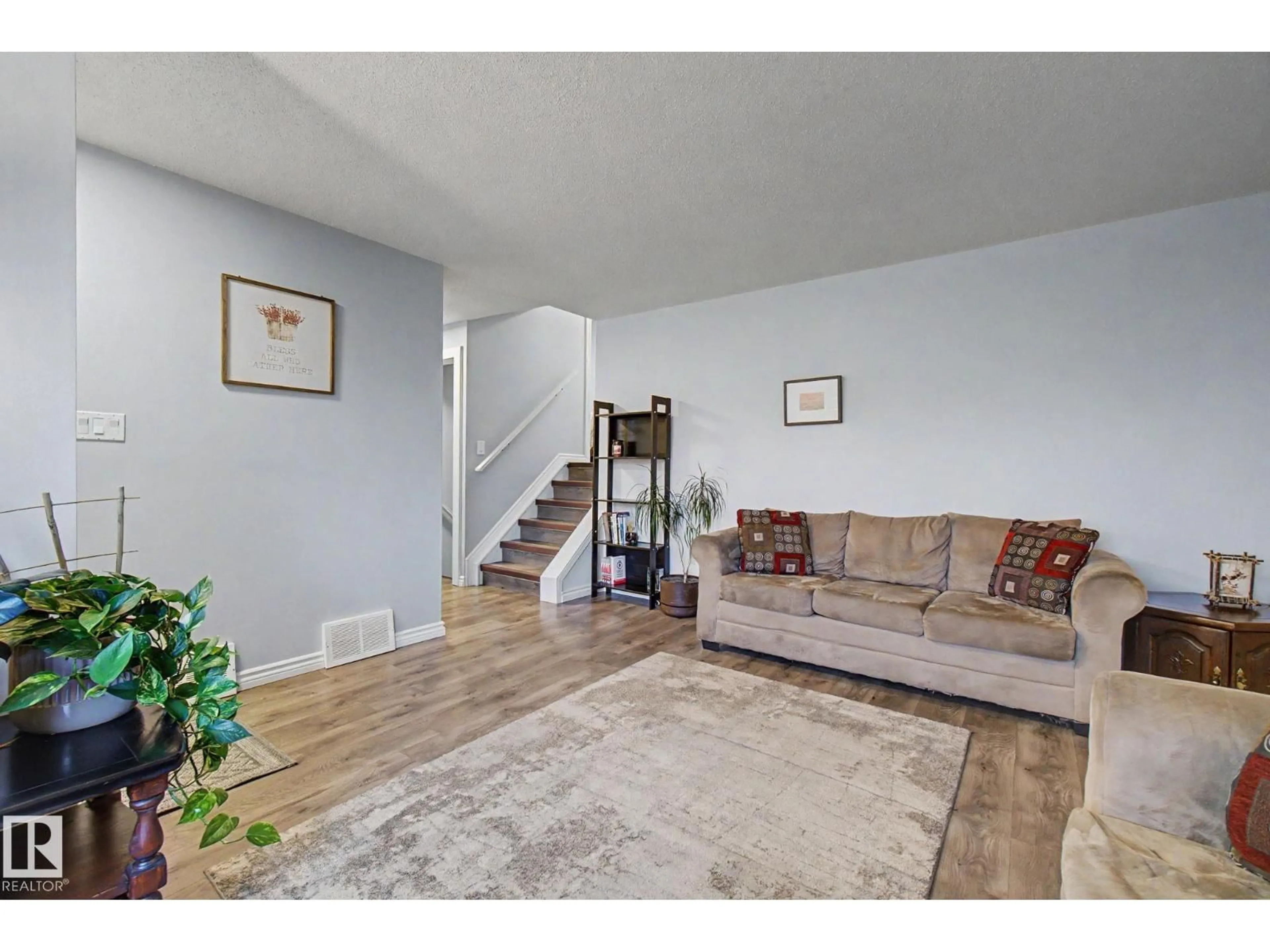Living room with furniture, unknown for 3706 41 AV, Edmonton Alberta T6L5M2