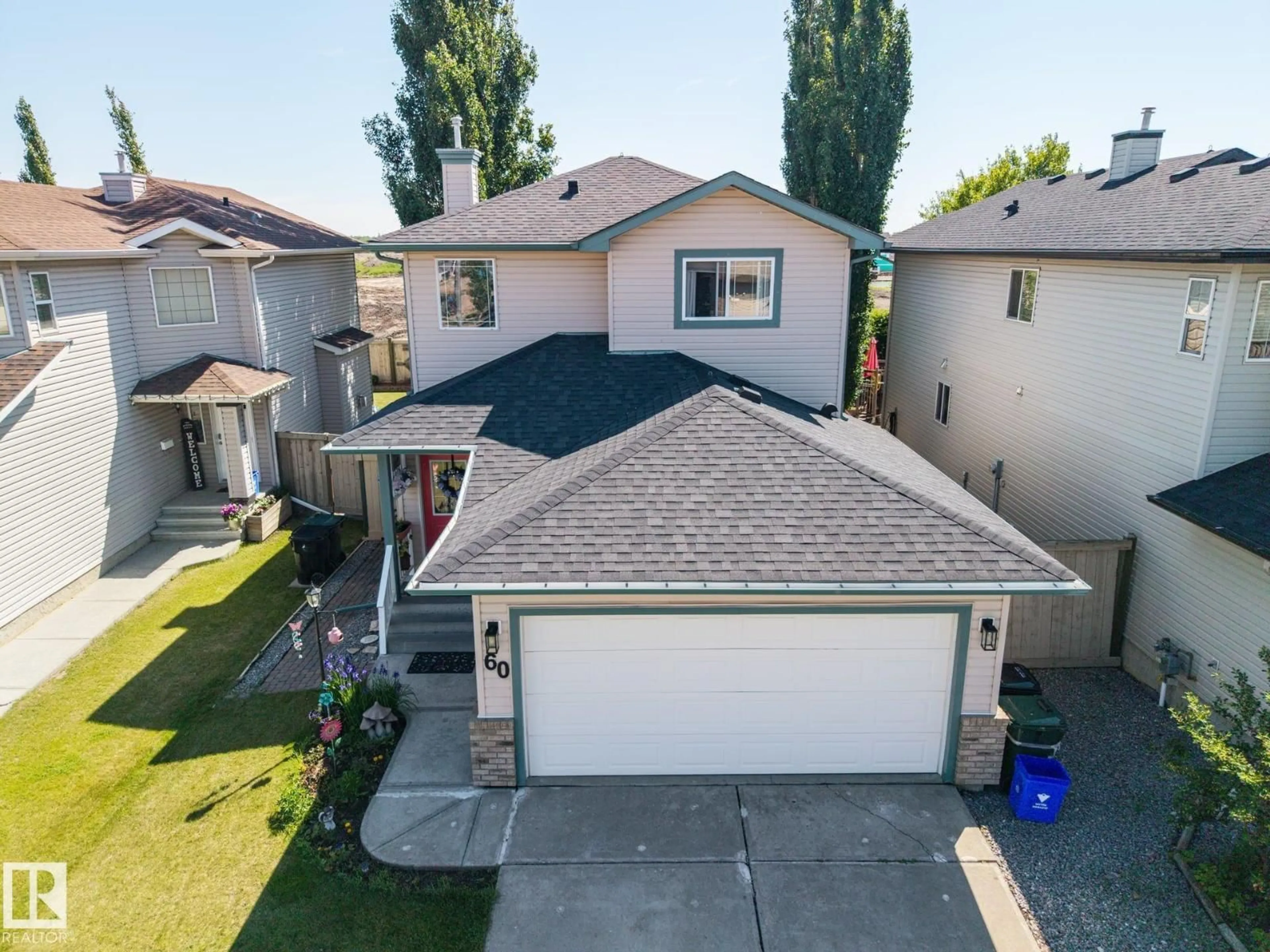 A pic from outside/outdoor area/front of a property/back of a property/a pic from drone, street for 60 LEYLAND WY, Spruce Grove Alberta T7X4P2