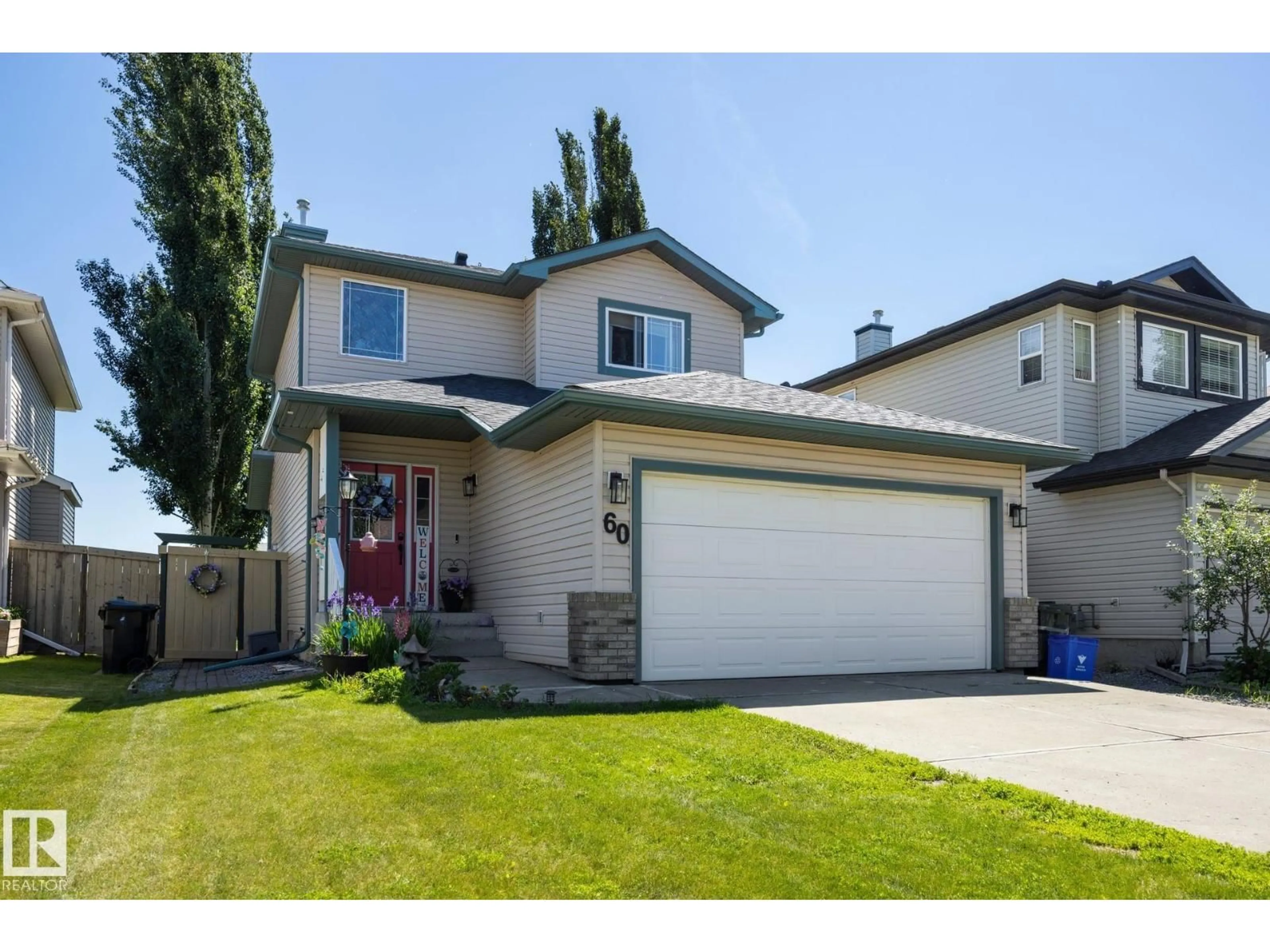 Home with vinyl exterior material, street for 60 LEYLAND WY, Spruce Grove Alberta T7X4P2