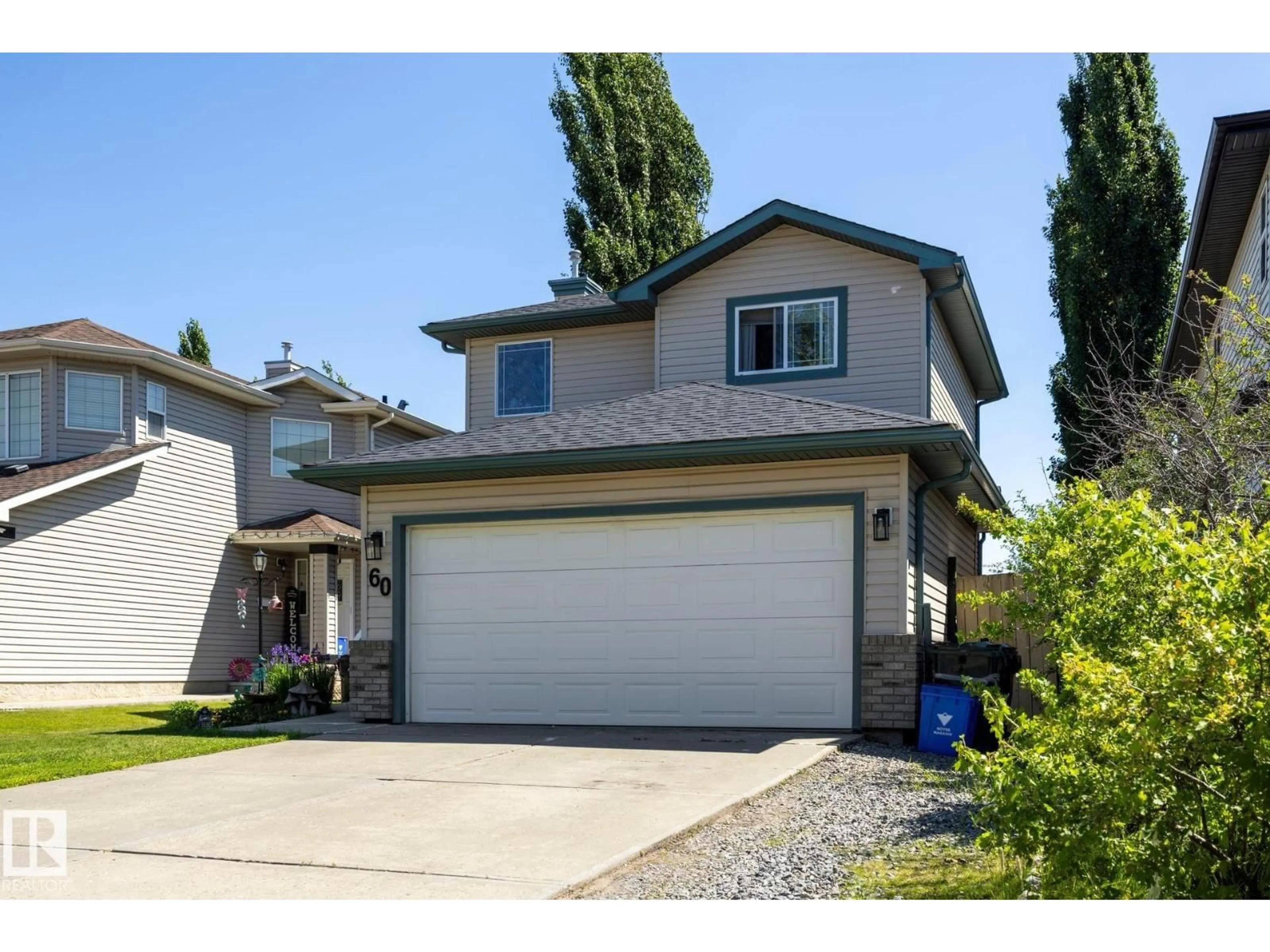 Home with vinyl exterior material, street for 60 LEYLAND WY, Spruce Grove Alberta T7X4P2