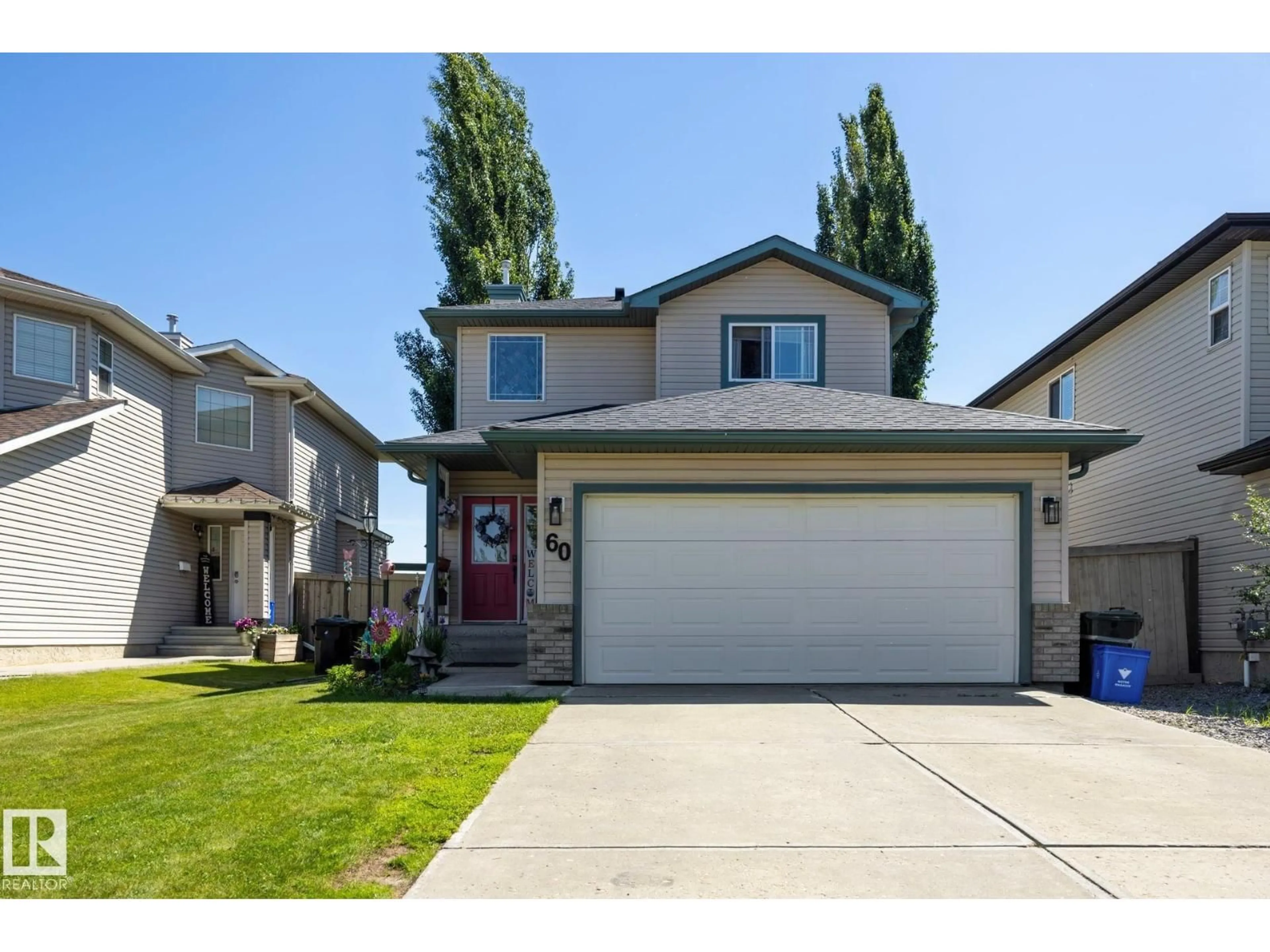 Home with vinyl exterior material, street for 60 LEYLAND WY, Spruce Grove Alberta T7X4P2