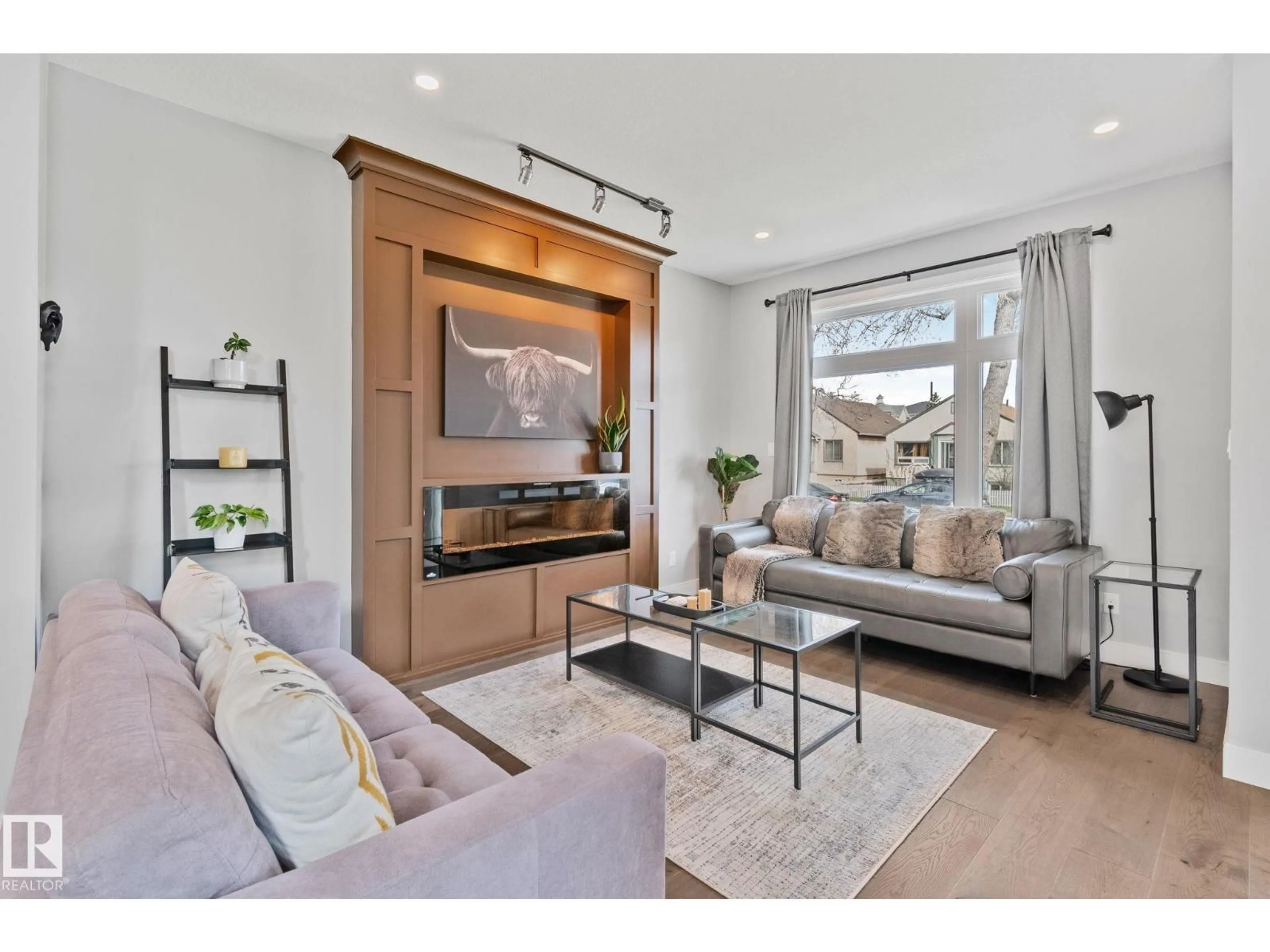 Living room with furniture, unknown for 9855 79 AV, Edmonton Alberta T6E1R2