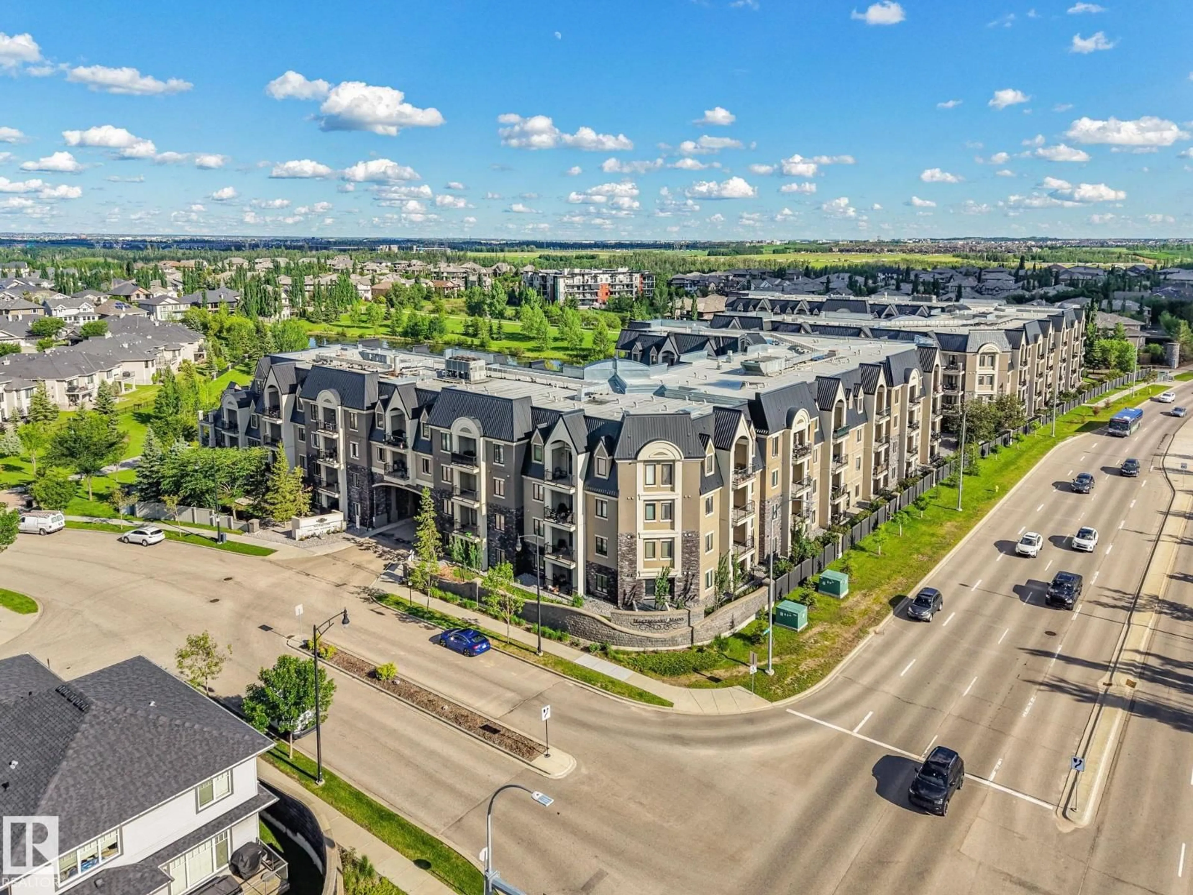 A pic from outside/outdoor area/front of a property/back of a property/a pic from drone, city buildings view from balcony for #403 - 6083 MAYNARD WY, Edmonton Alberta T6R0S5