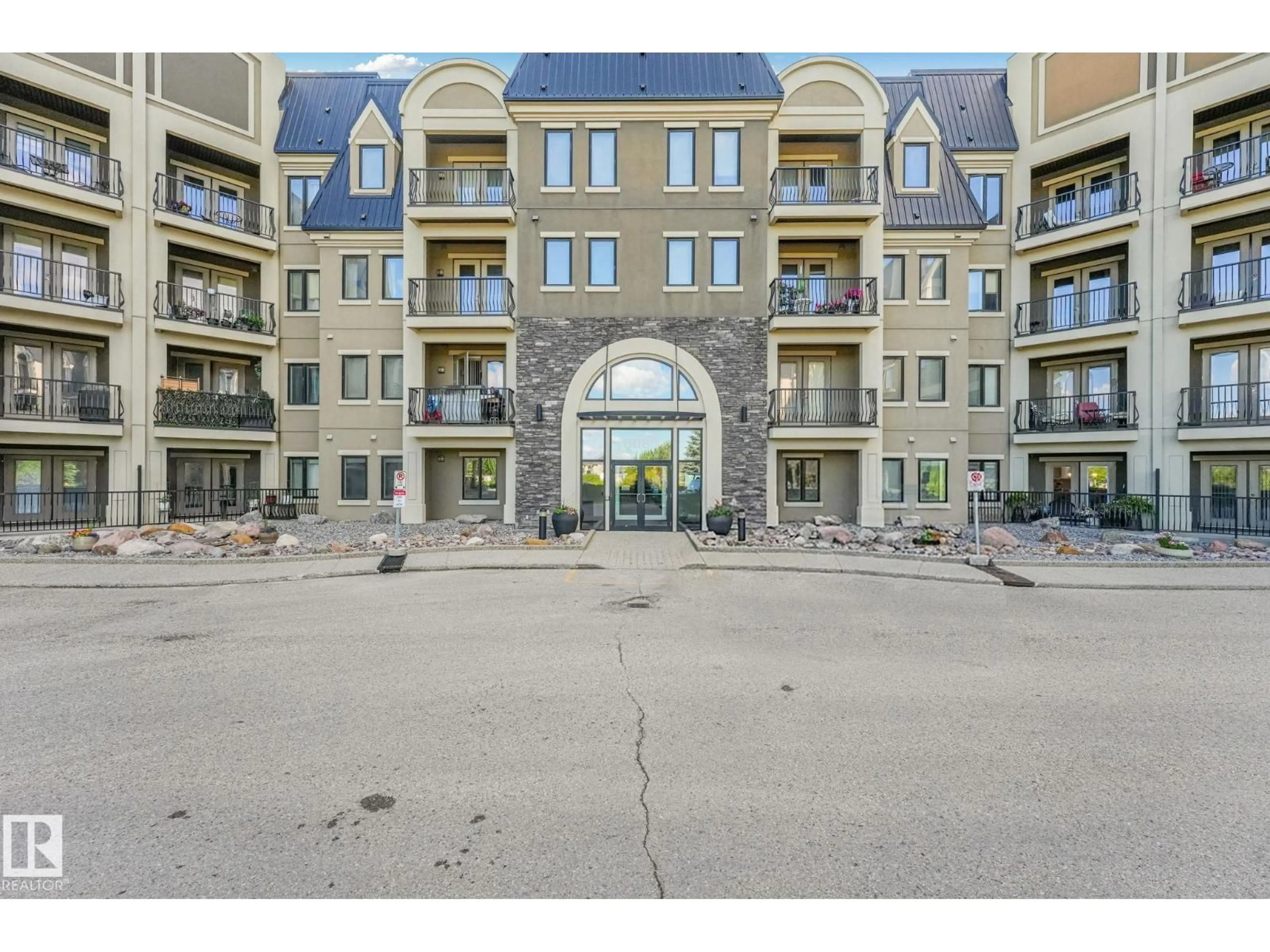 Indoor foyer for #403 - 6083 MAYNARD WY, Edmonton Alberta T6R0S5