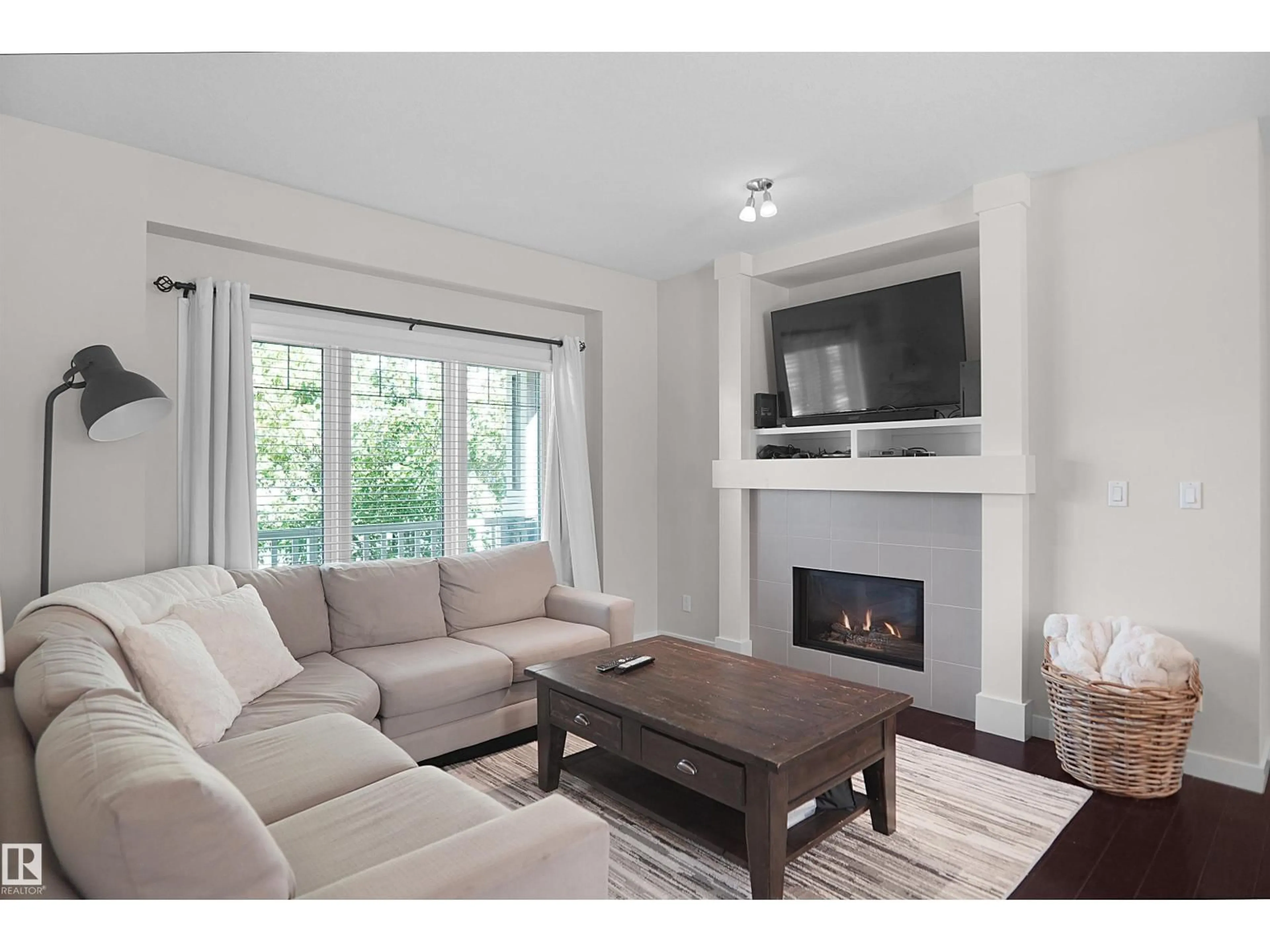 Living room with furniture, wood/laminate floor for 181 HAWKS RIDGE BV, Edmonton Alberta T5S0H6