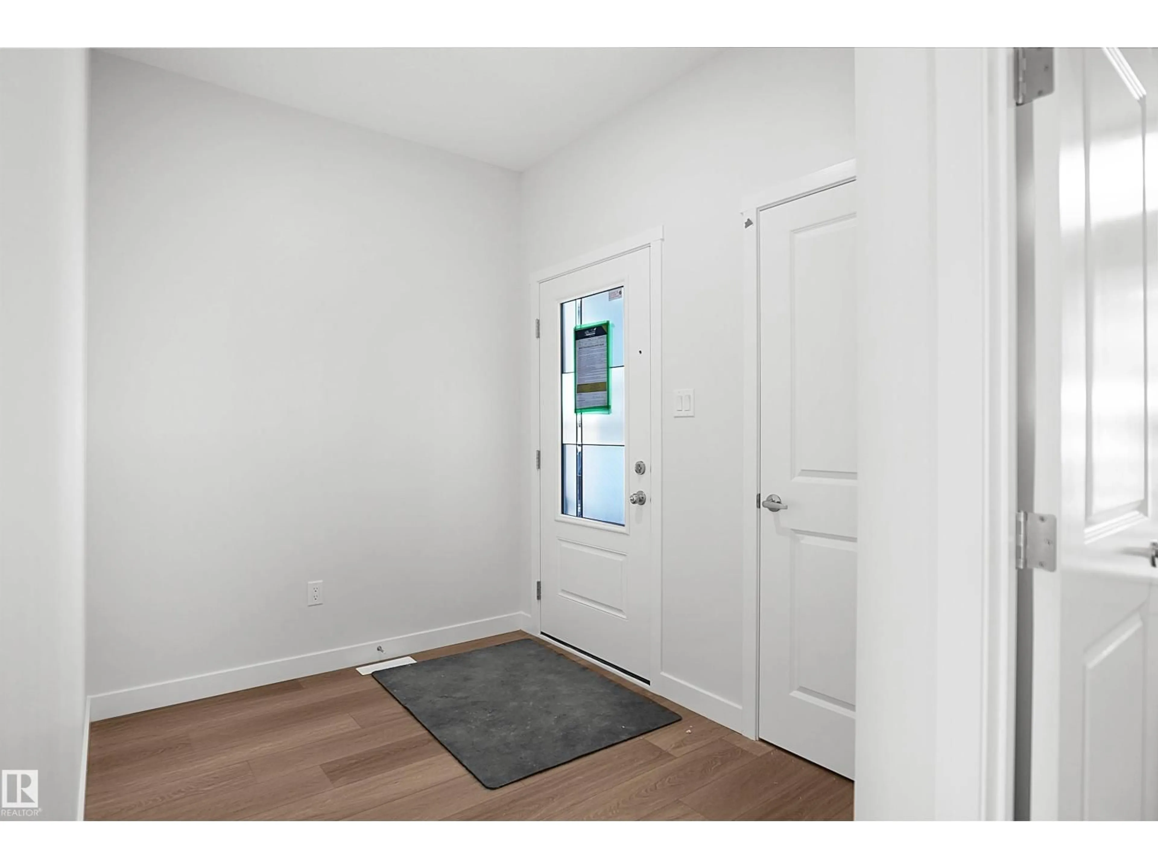 Indoor entryway for 1631 11 AV, Edmonton Alberta T6T2S5