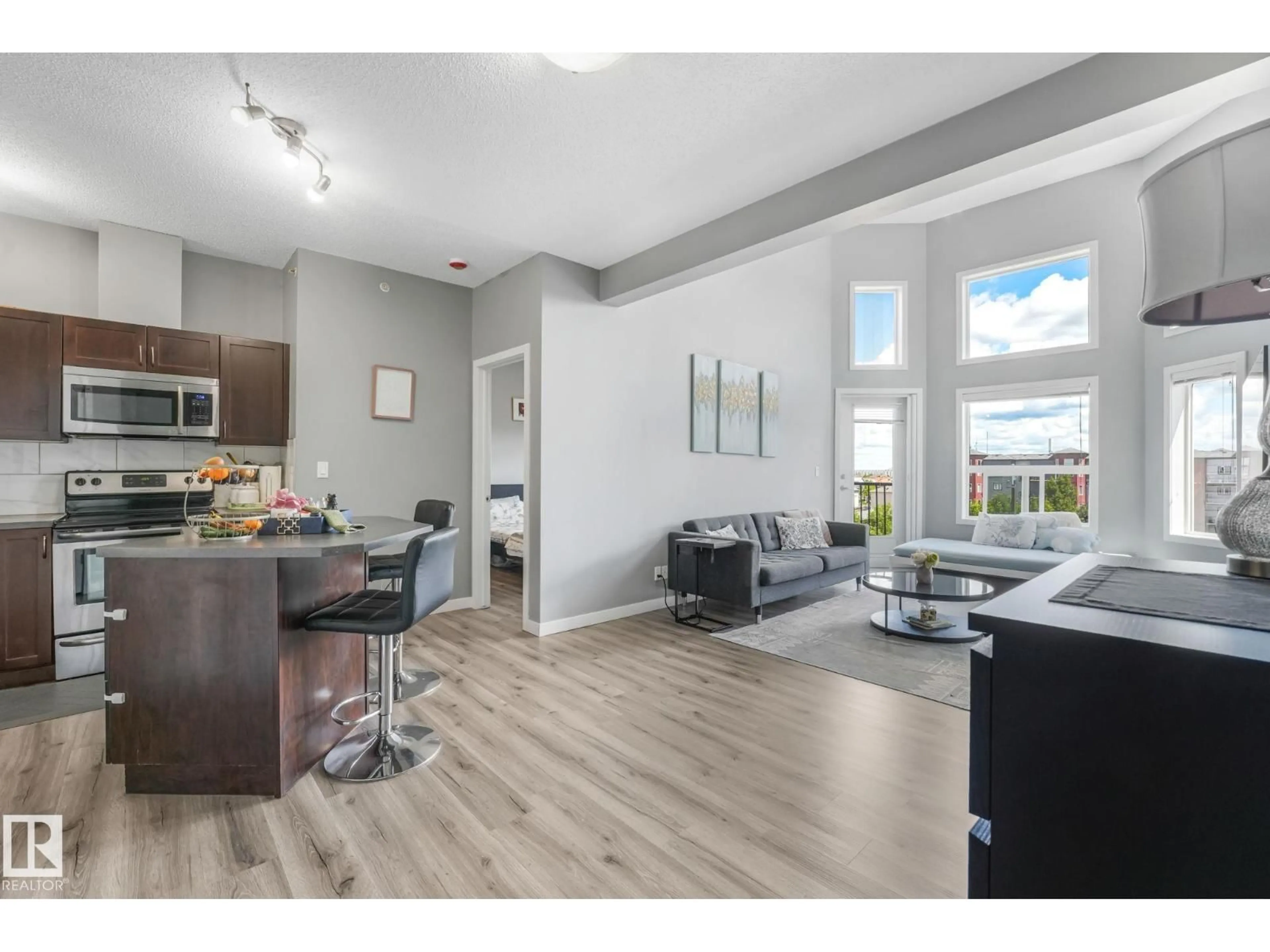 Open concept kitchen, wood/laminate floor for 396 - 417 SILVER BERRY RD, Edmonton Alberta T6T0H1