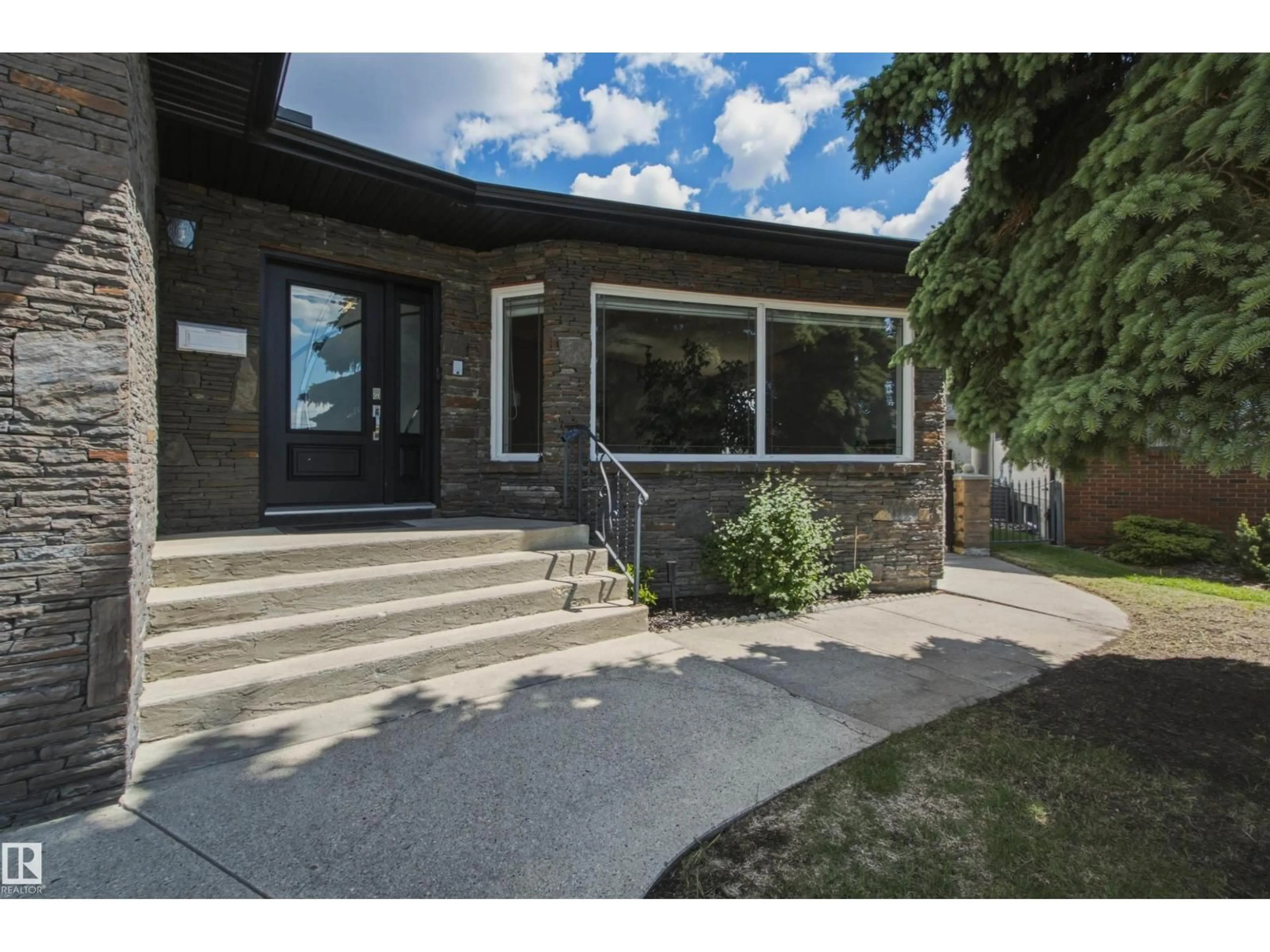 Home with brick exterior material, street for NW - 16315 99 ST, Edmonton Alberta T5X5J1