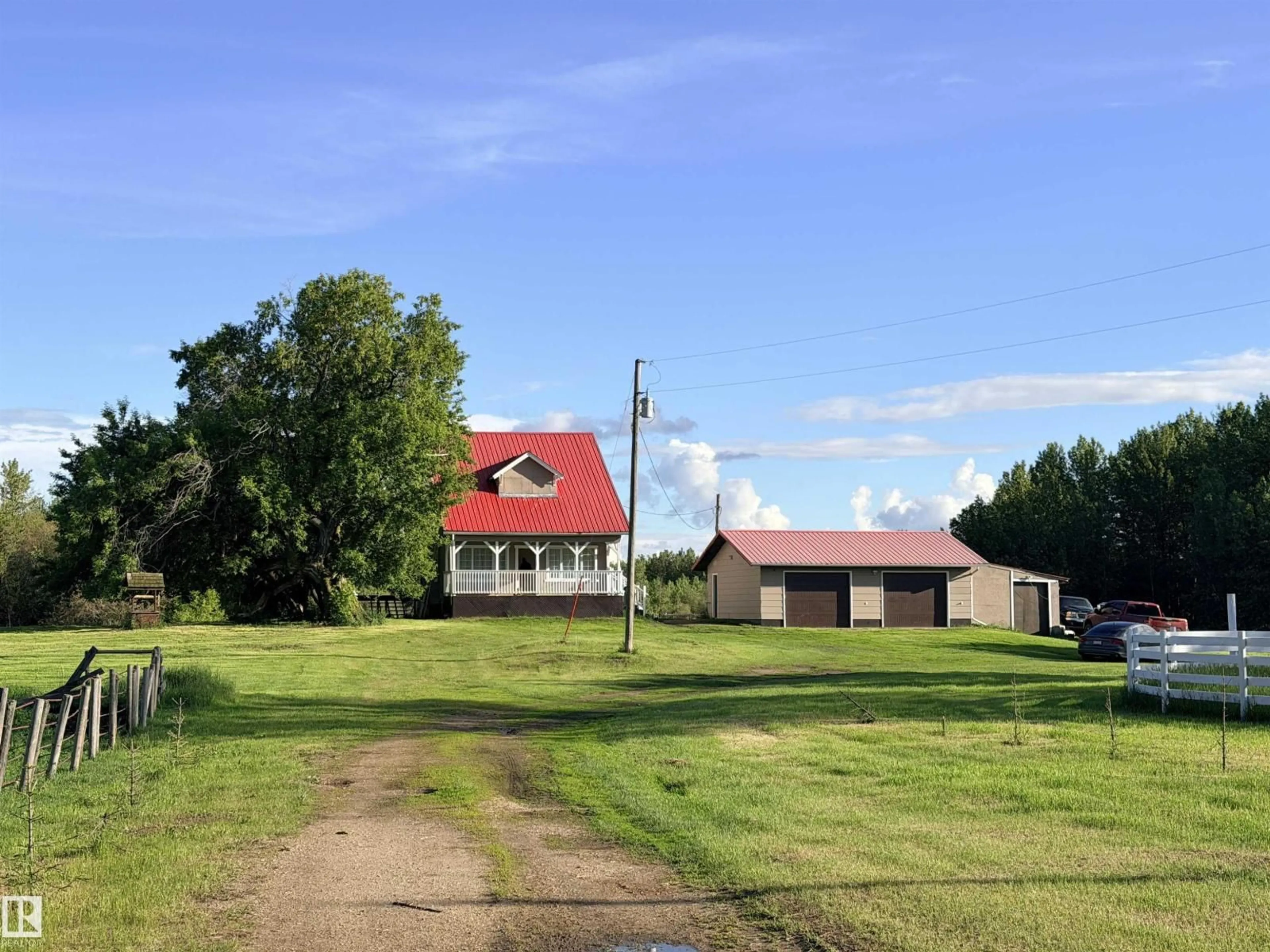 A pic from outside/outdoor area/front of a property/back of a property/a pic from drone, unknown for 24423 TWP ROAD 605A, Rural Westlock County Alberta T0G1S0