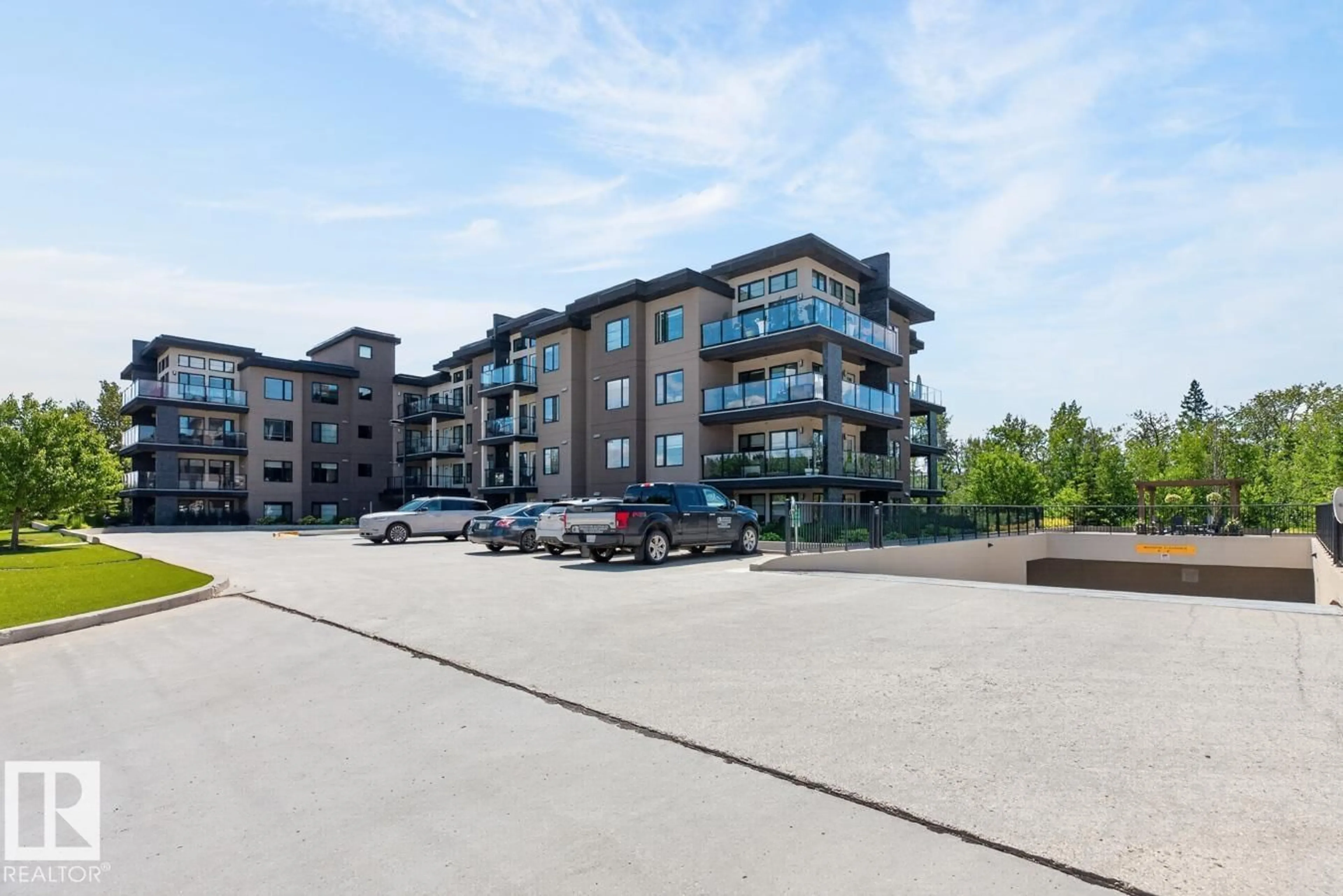 A pic from outside/outdoor area/front of a property/back of a property/a pic from drone, building for #207 - 5025 EDGEMONT BV, Edmonton Alberta T6M0S8