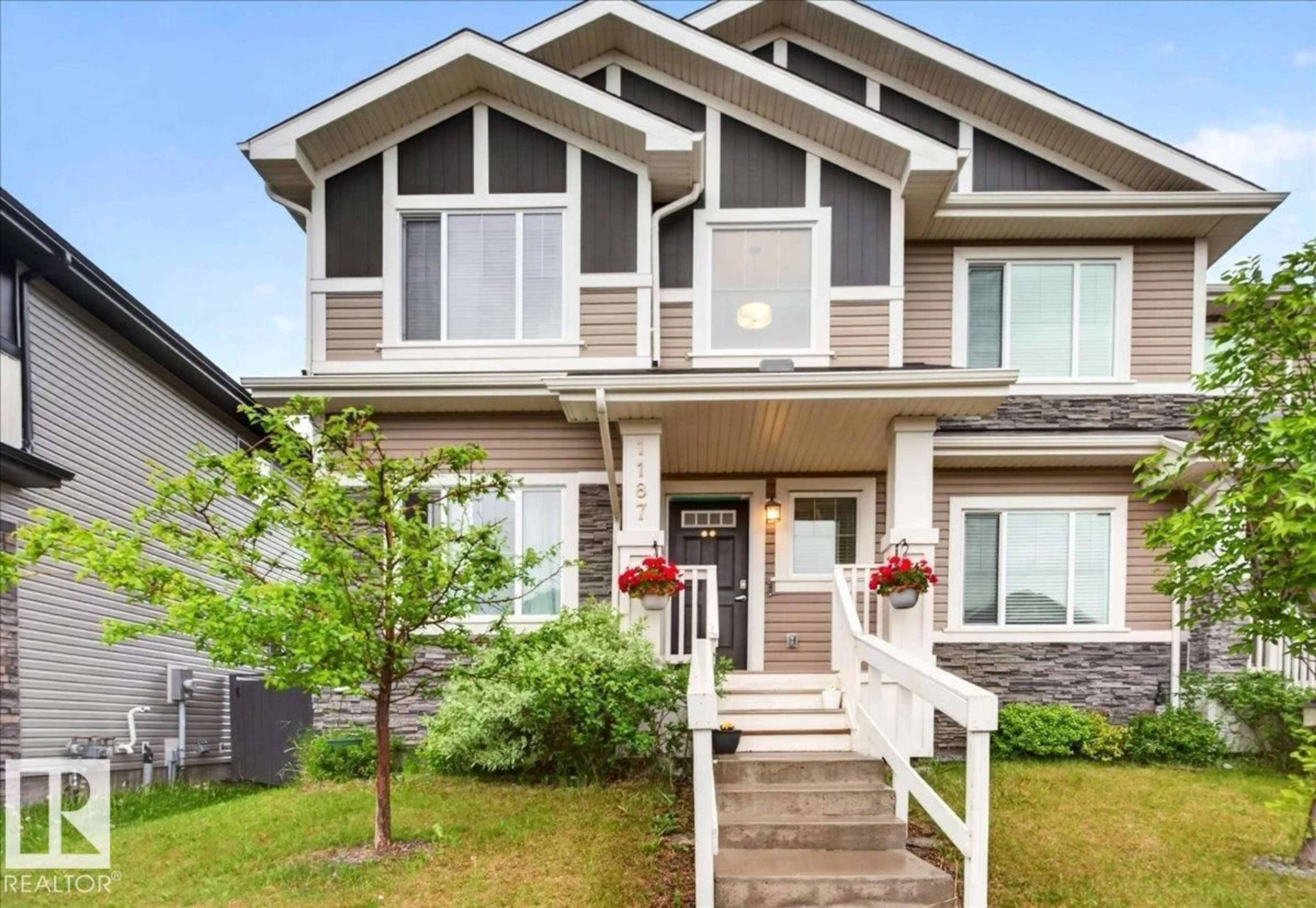 Home with vinyl exterior material, street for 1187 CY BECKER RD, Edmonton Alberta T5Y3V9